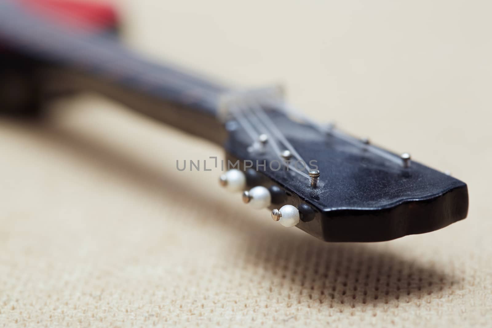 Acoustic guitare. Close-up view with shallow depth of field