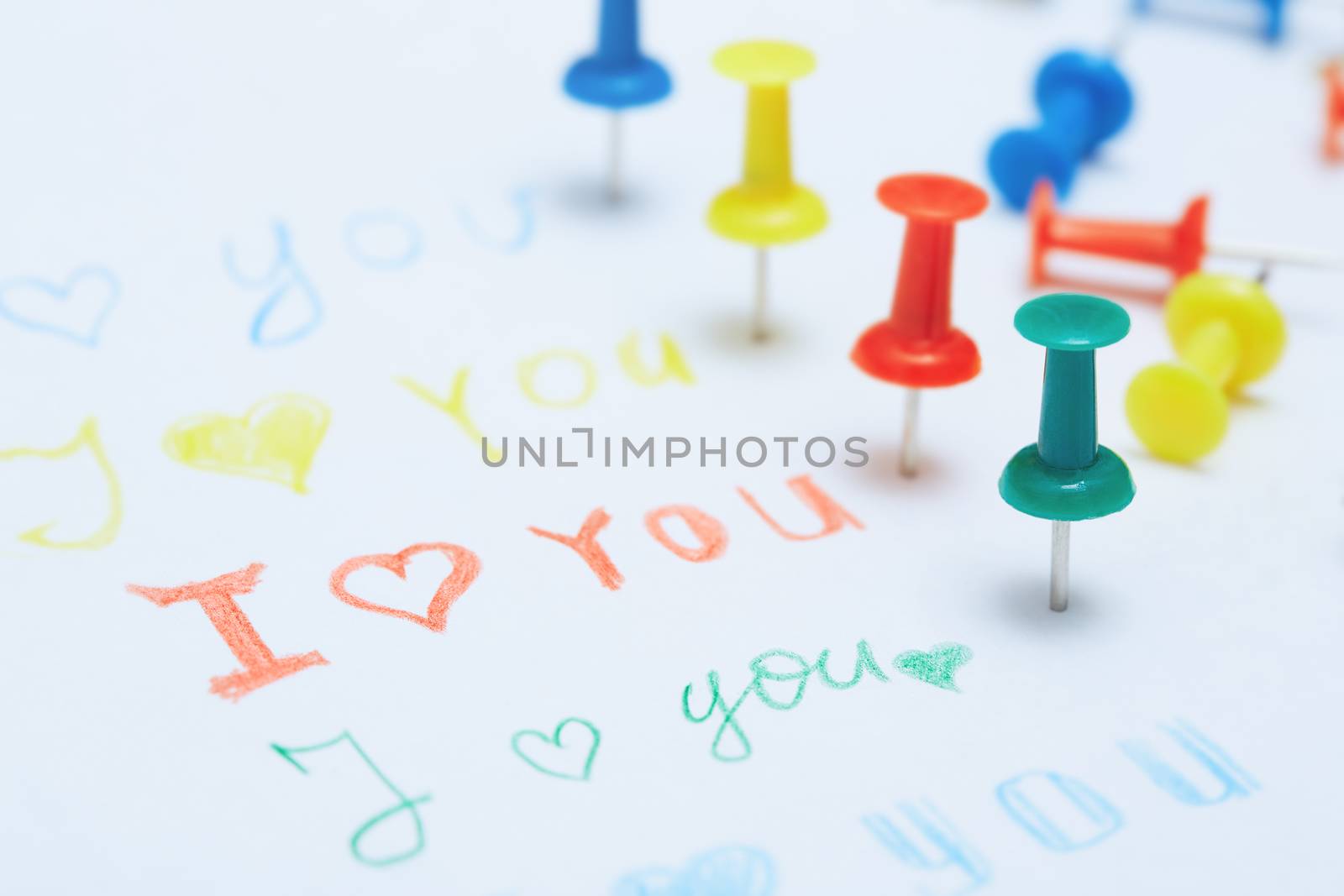 Love you letter with colorful push pins