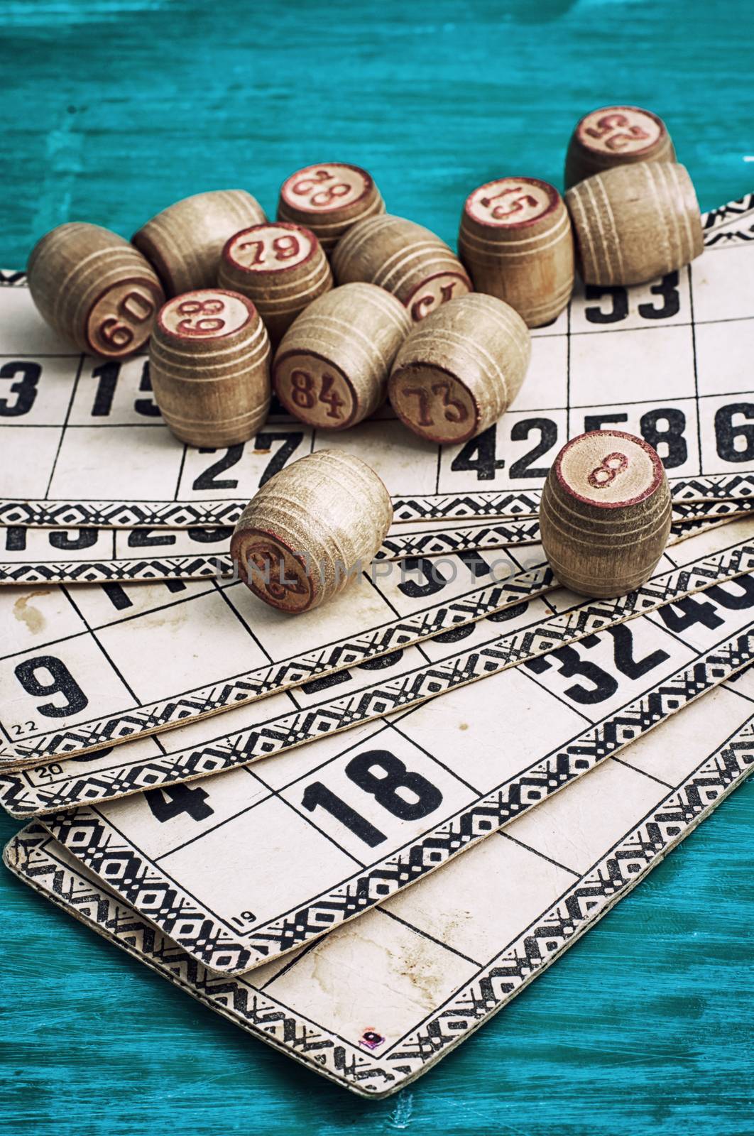traditional legacy of the ancient Board game Lotto on wooden background
