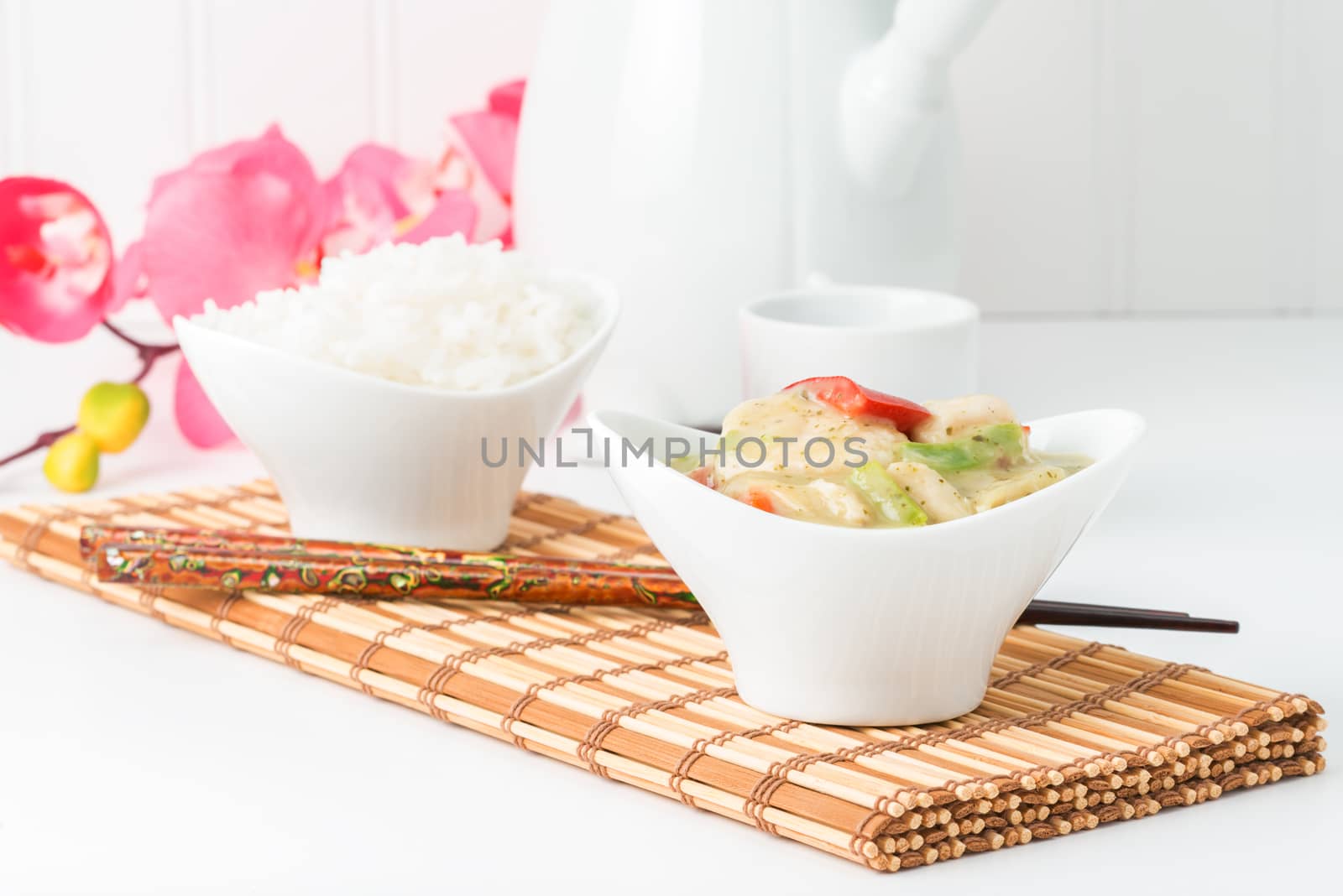 Green curry chicken served with white jasmine rice.