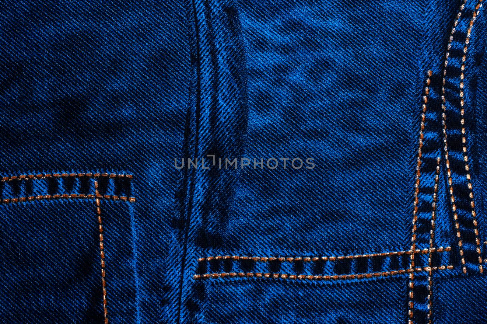texture background with blue denim fabric with stitches of thread