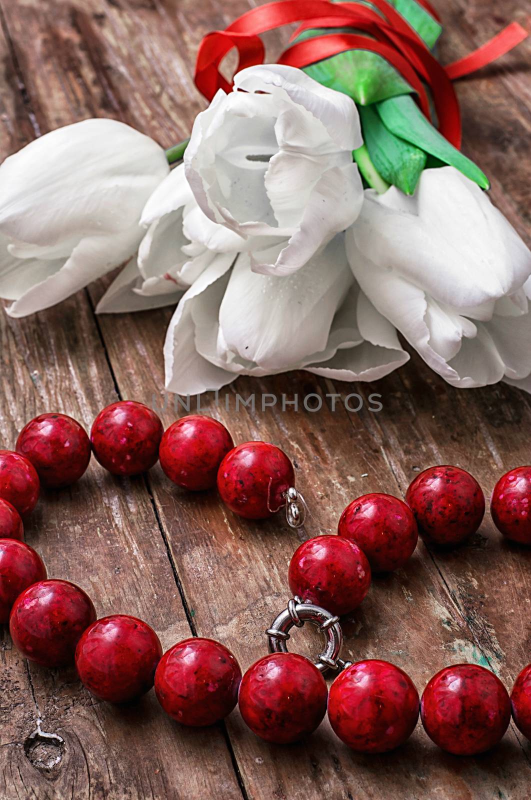 tulips and womens coral beads by LMykola