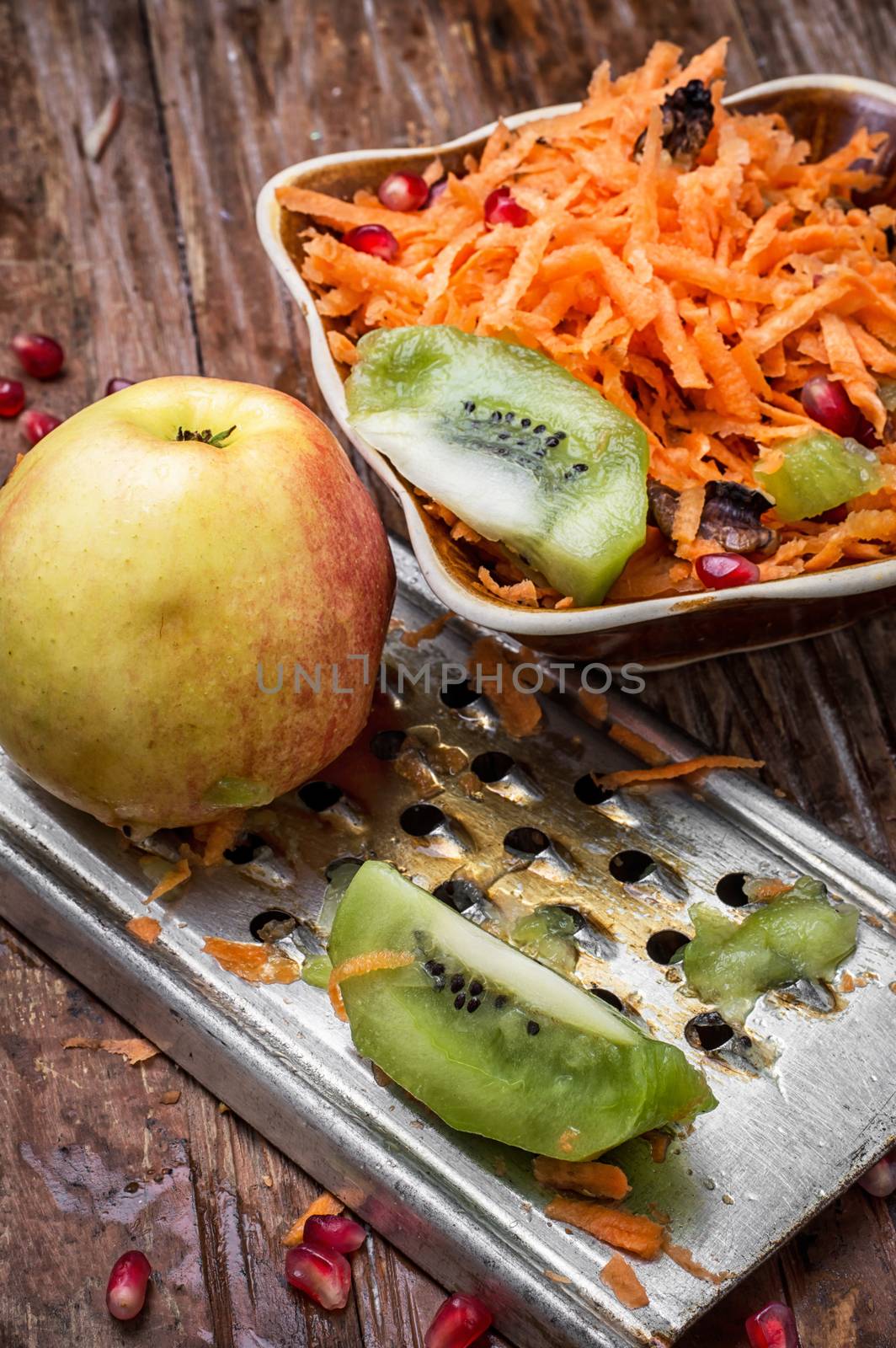 process of rubbing fragrant ripe fruit and carrots fruit salad