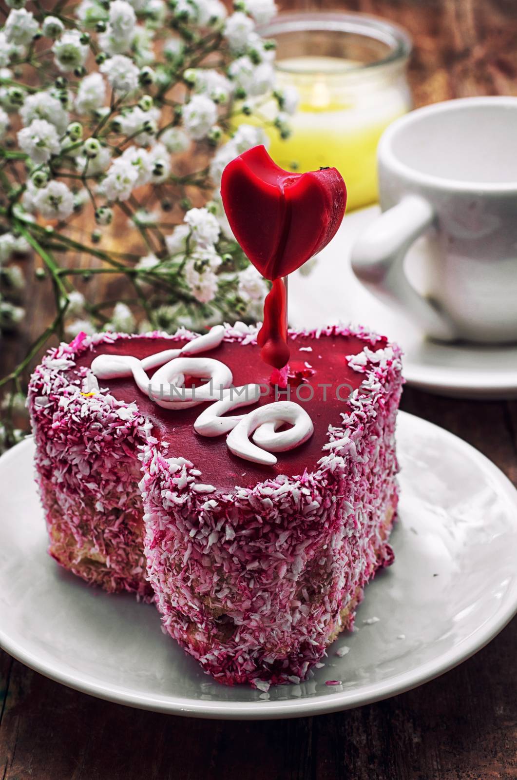 cake with fruit filling in the shape of heart with the inscription love