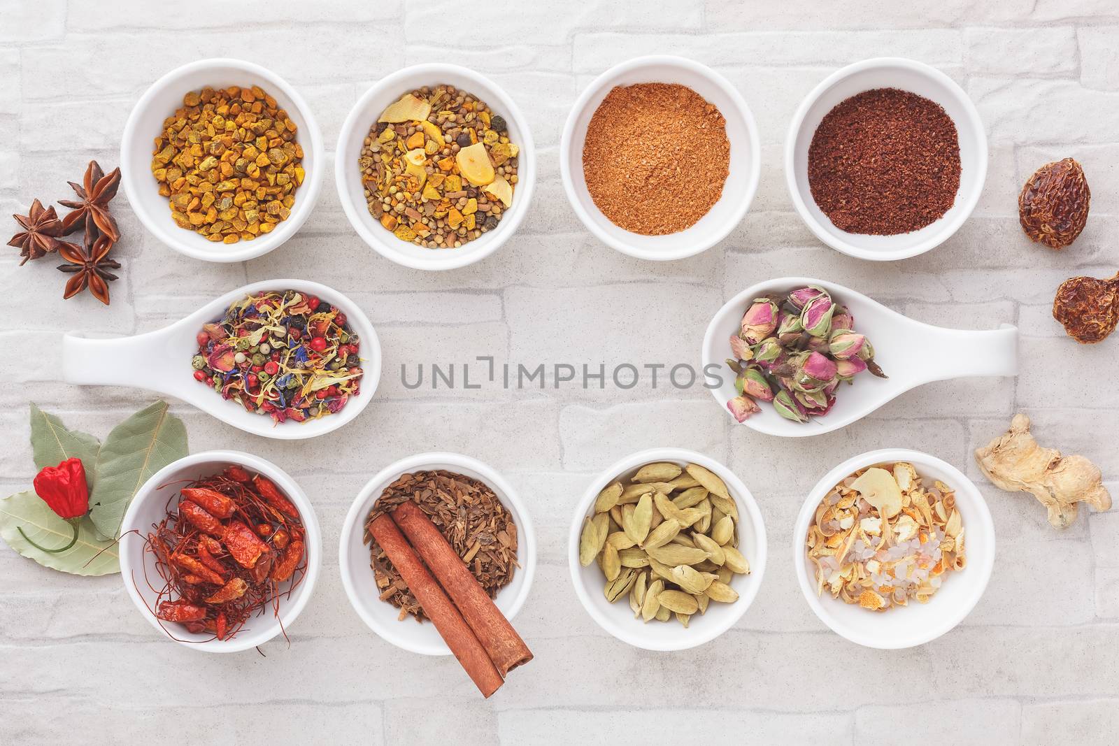 A collection of ground and whole spices. Top view, blank space, vintage toned image. Natural light