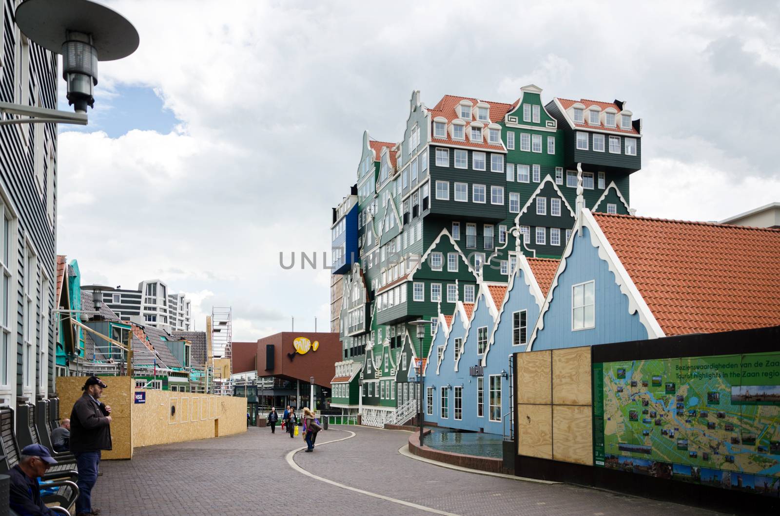 Zaandam, Netherlands - May 5, 2015: People walk on a pedestrian zone in Zaandam by siraanamwong