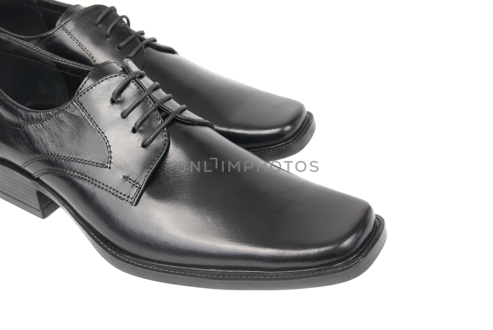 Pair of man's black shoes by vapi