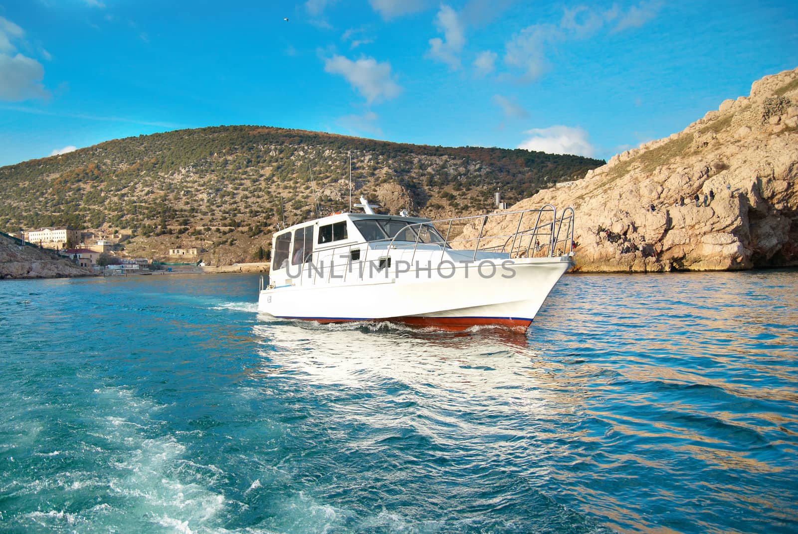 Motor boat cruising the sea by vapi