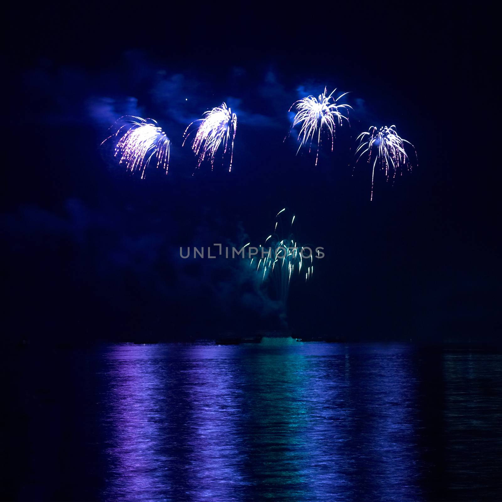 Colorful holiday fireworks by vapi