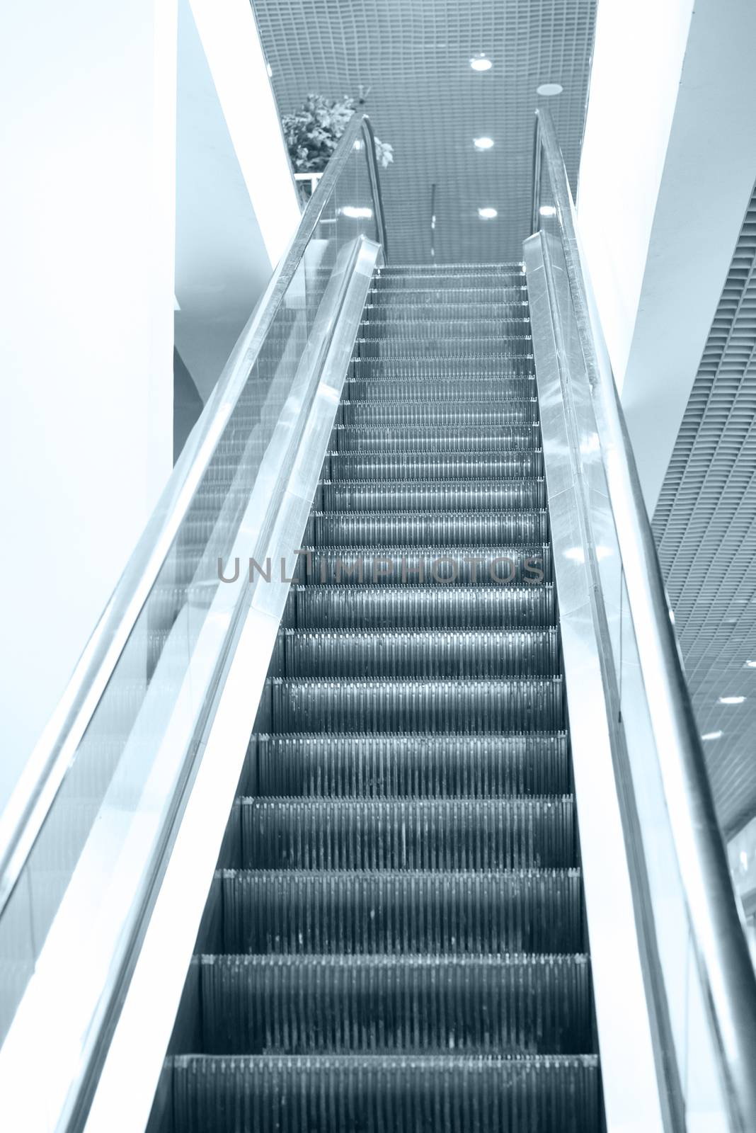 Empty escalator steps on staircase in the airport