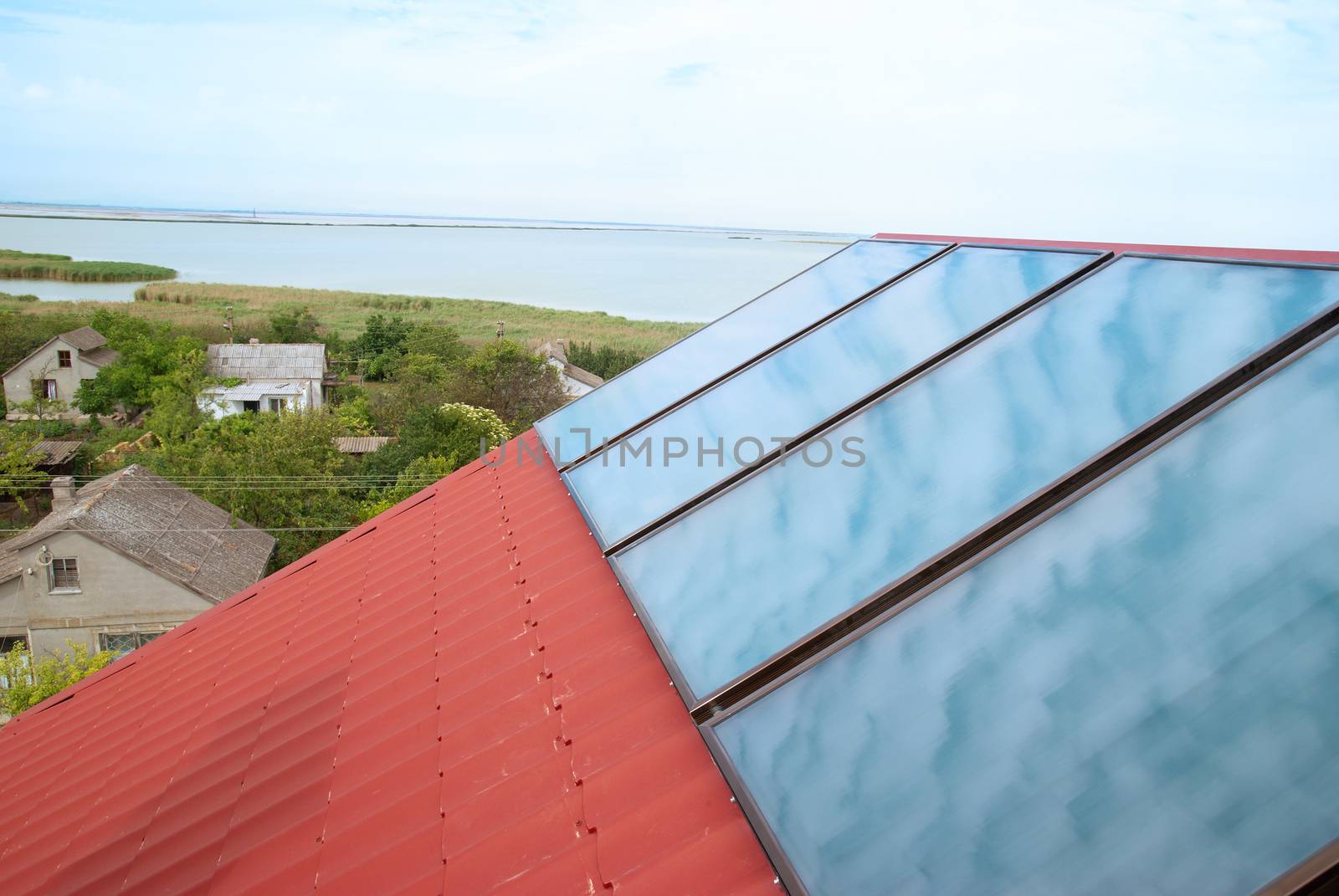 Solar (helio) heating system on the red house roof