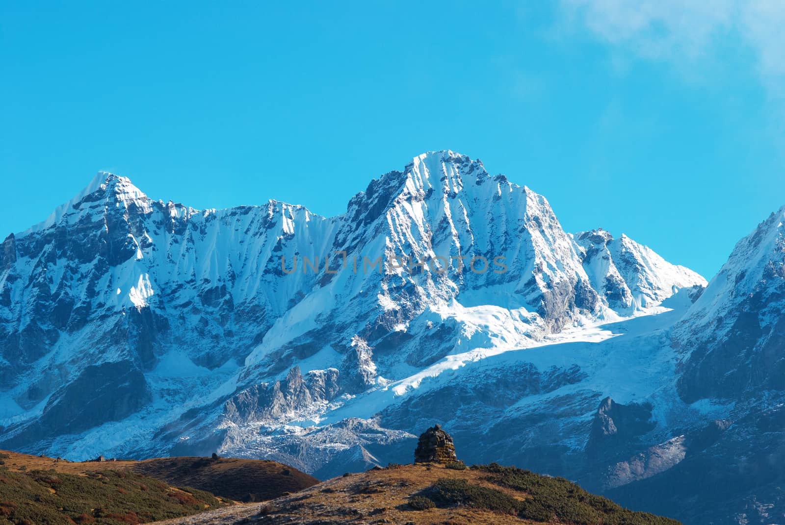 Top of High mountains, covered by snow. Kangchenjunga, India.