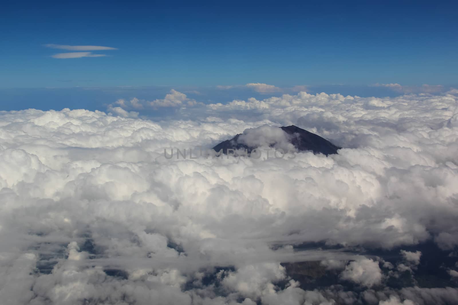 Soft clouds over view from airplane flying