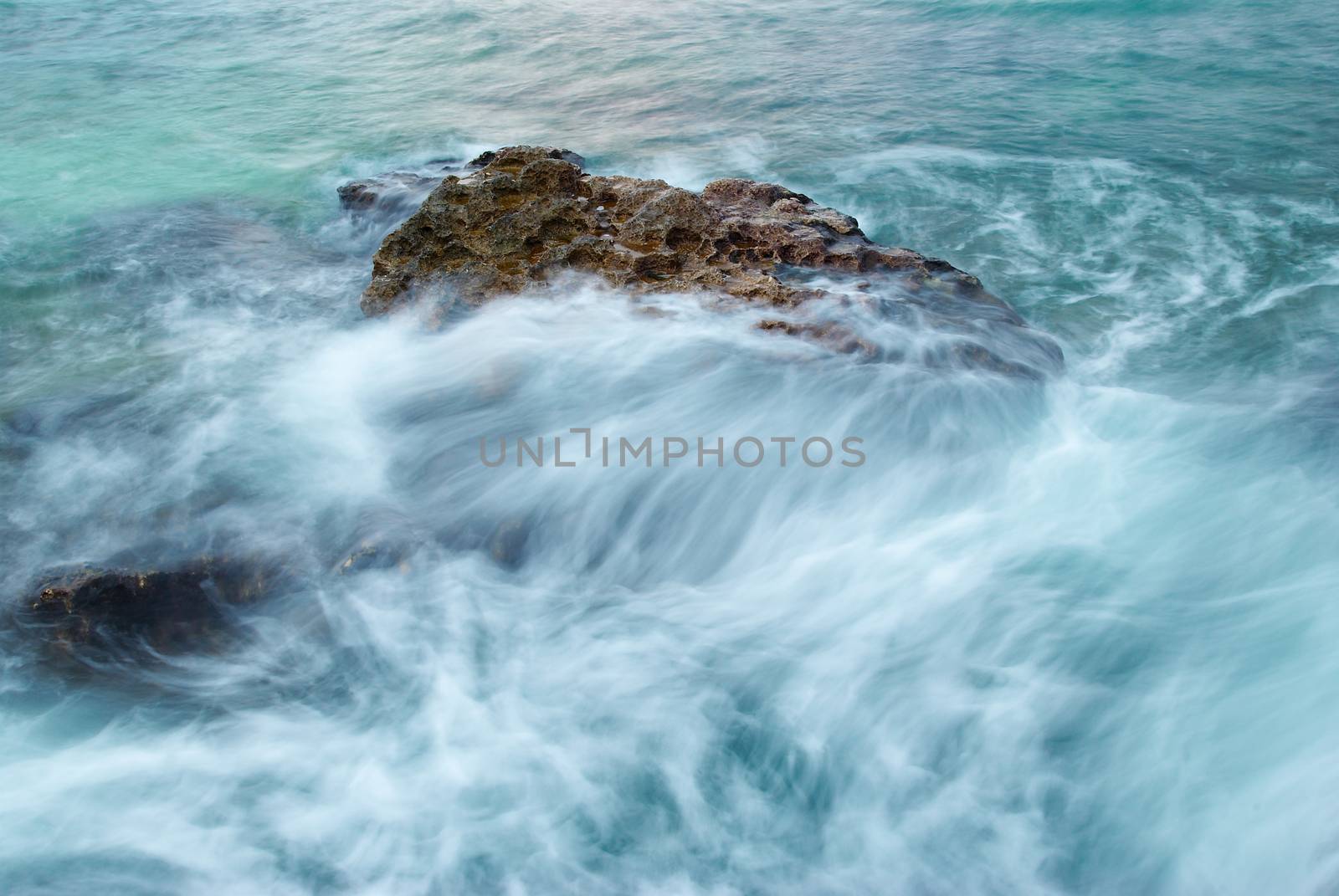 Storm, rock near the shore.