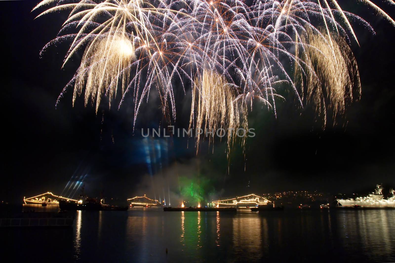 Beautiful blue holiday fireworks on the black sky background. Holiday event