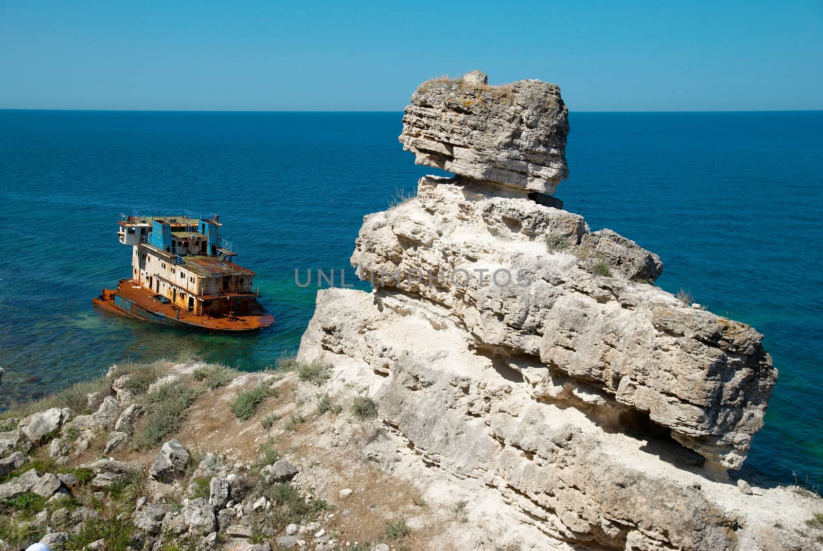 Wreck ship near the coast.