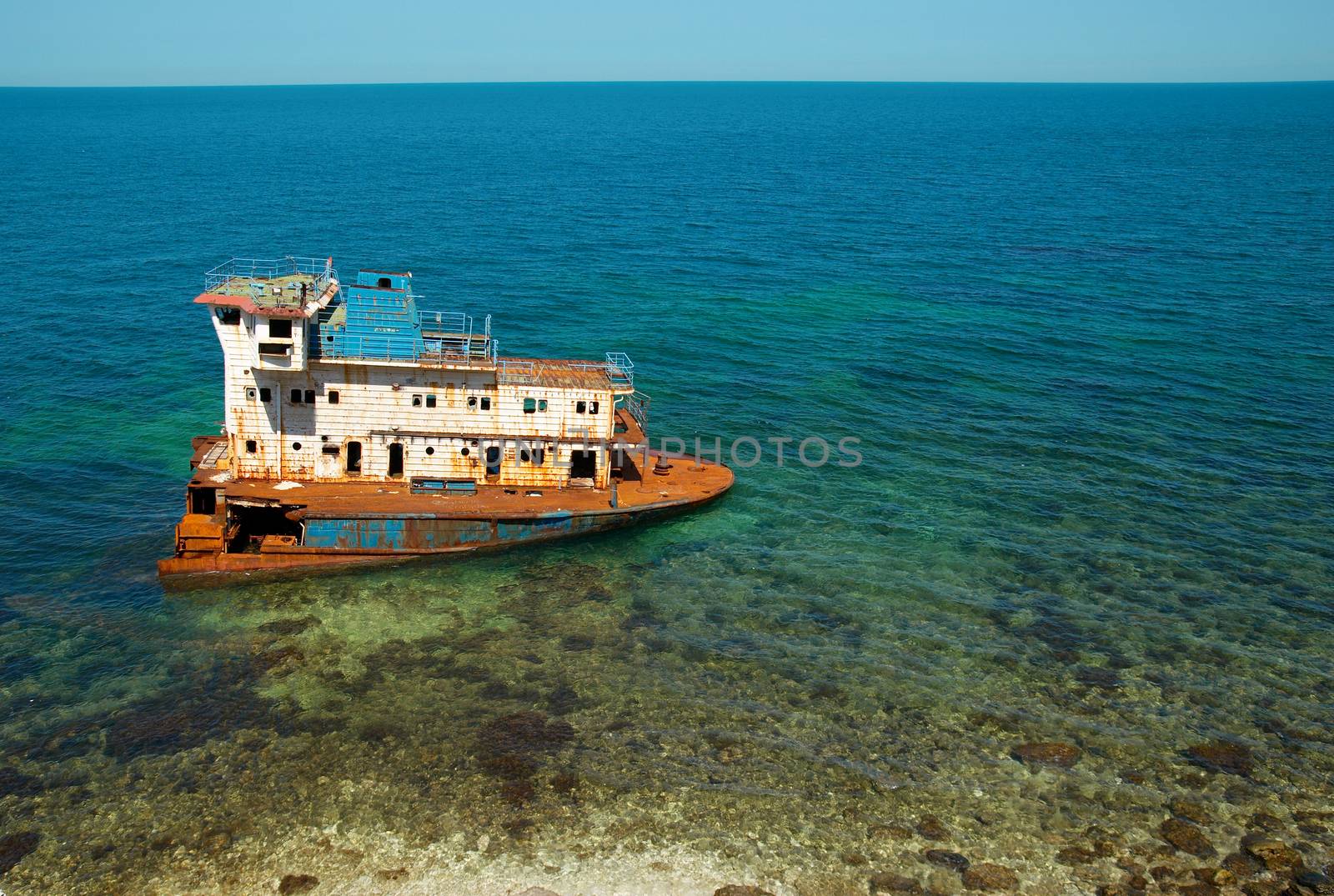 Wreck ship near the coast.