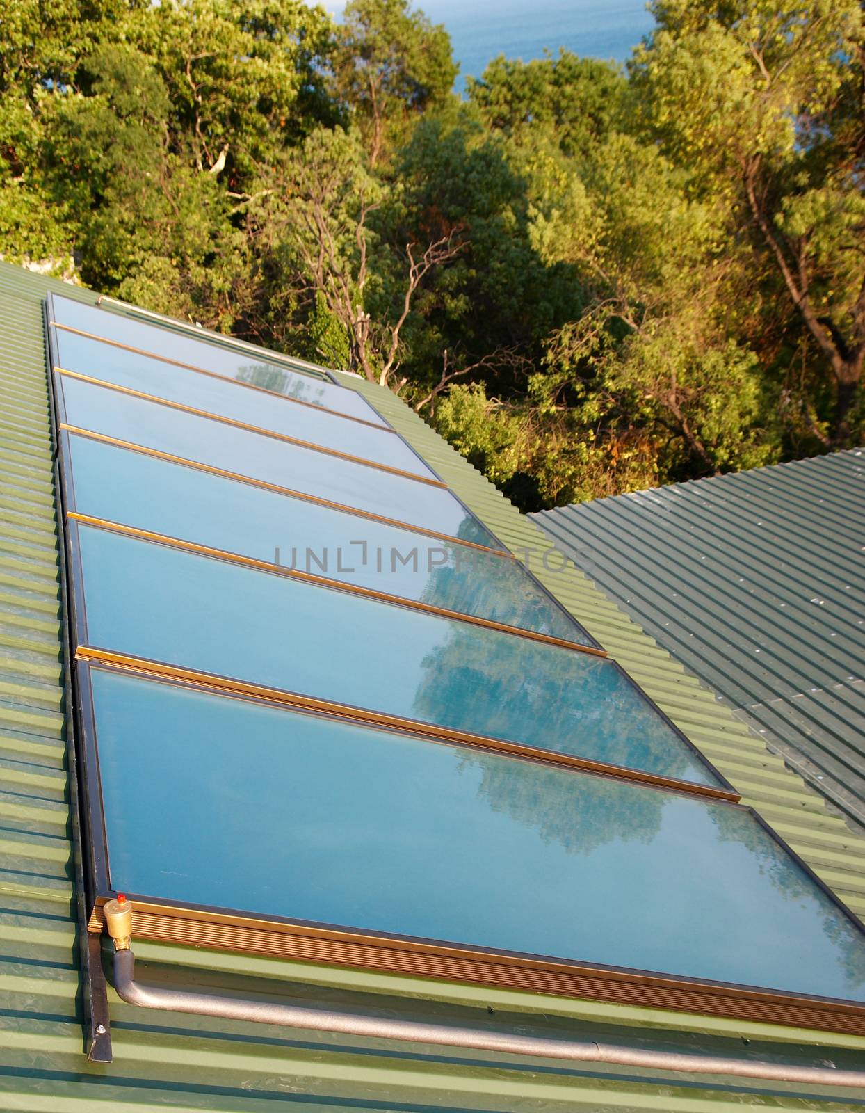 Solar panels (geliosystem) on the house roof.