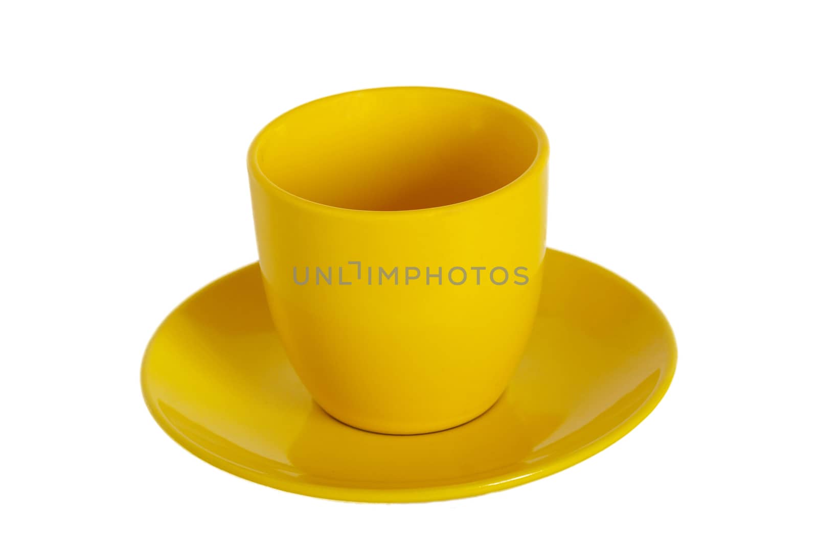 Yellow tea cup and saucer on white background. by vapi