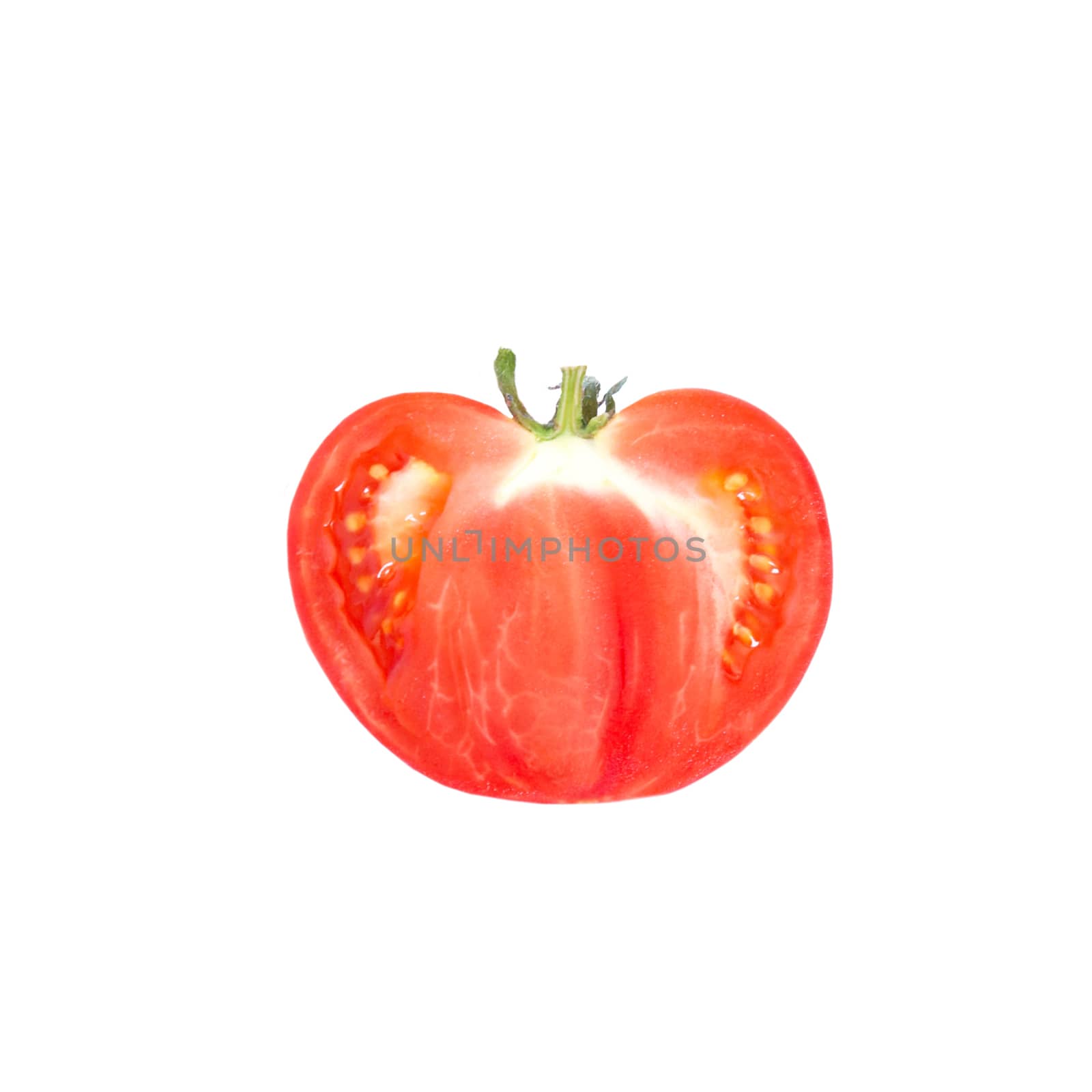 A half of fresh tomato isolated on white. by vapi