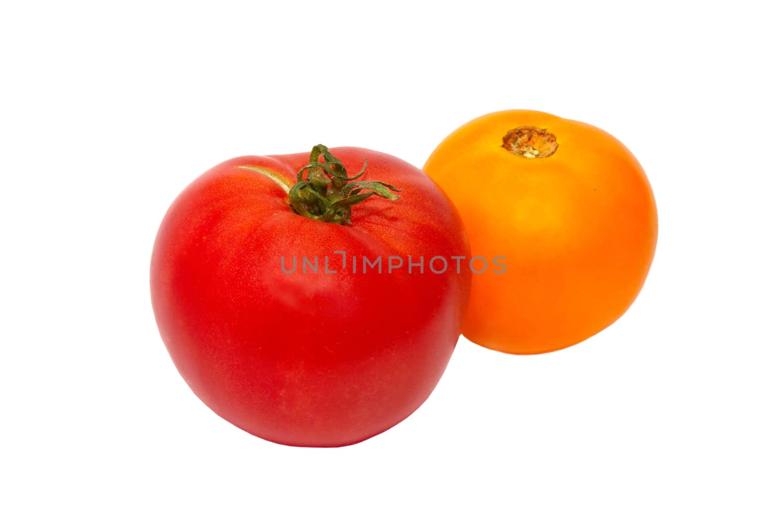 A fresh red and yellow tomatoes isolated on white. by vapi