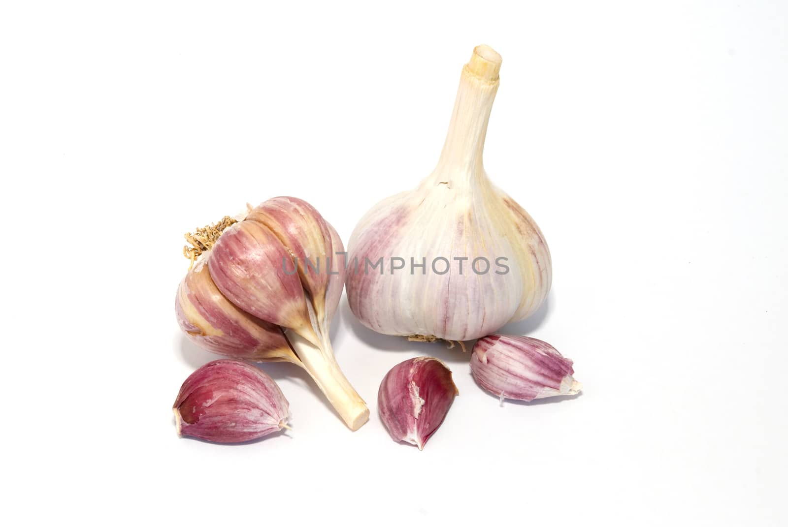 A garlic bulbs isolated on white. by vapi