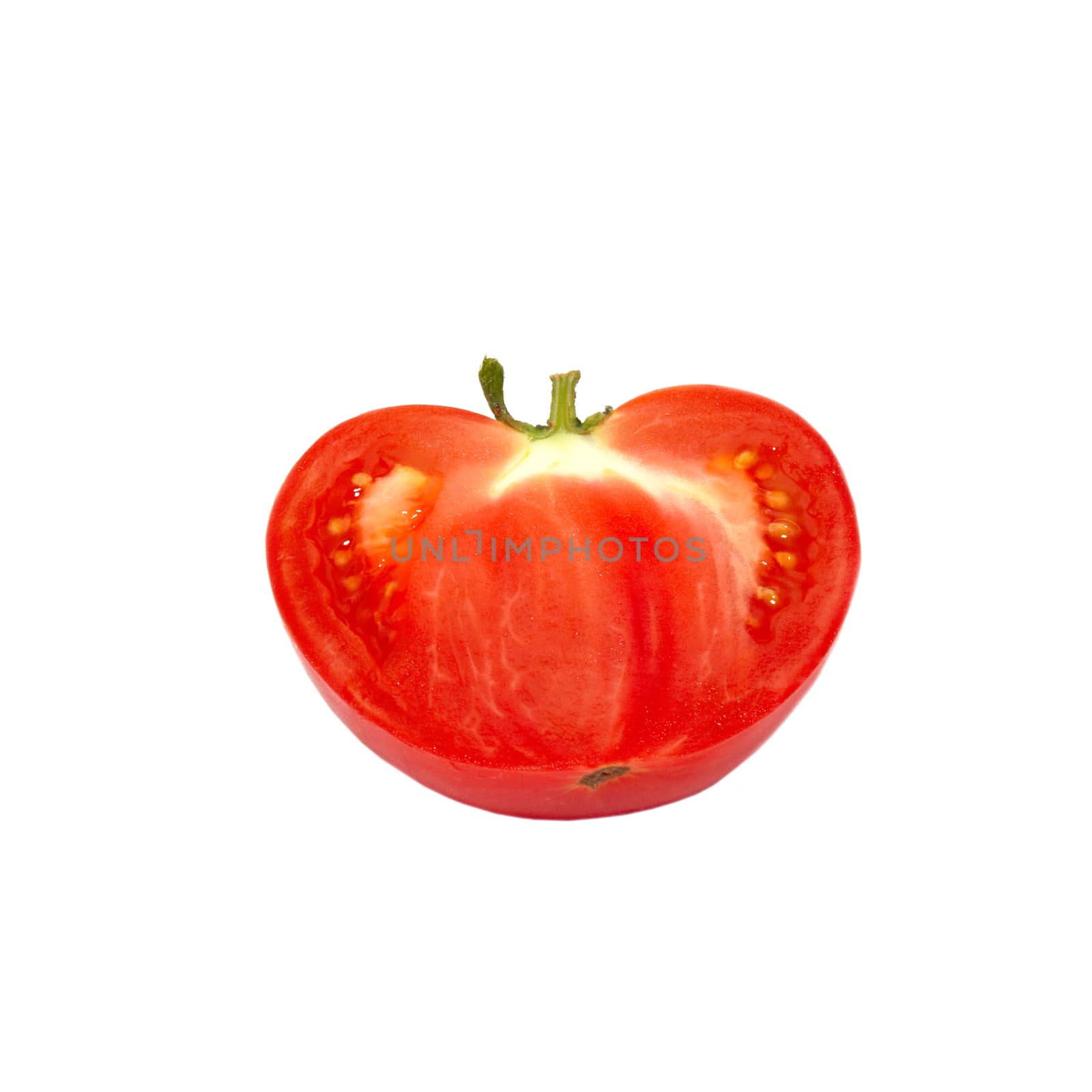 A half of fresh tomato isolated on white. by vapi