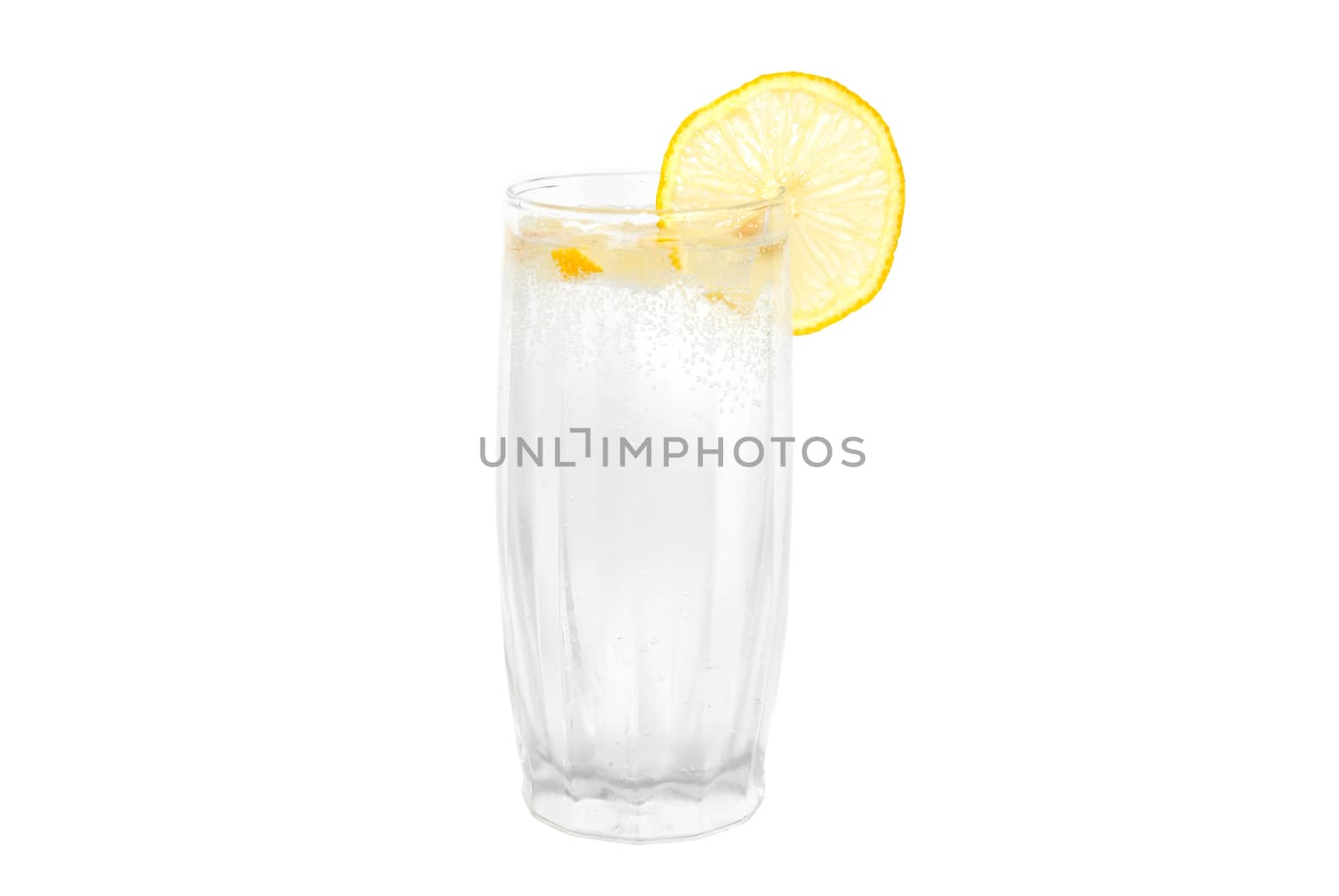 A cold water glass with lemon isolated on white. by vapi