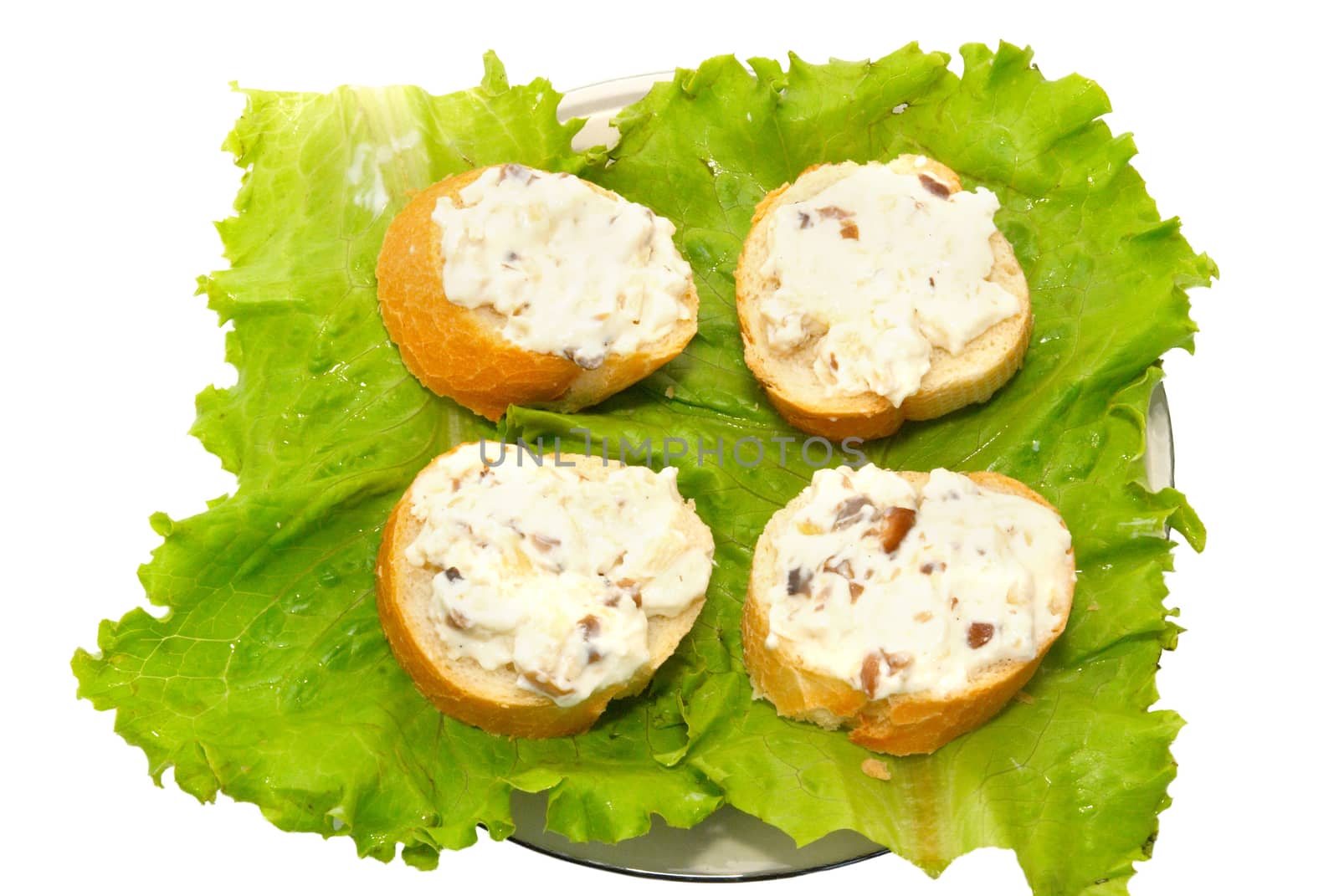 Four sandwiches with green lettuce isolate on white. by vapi