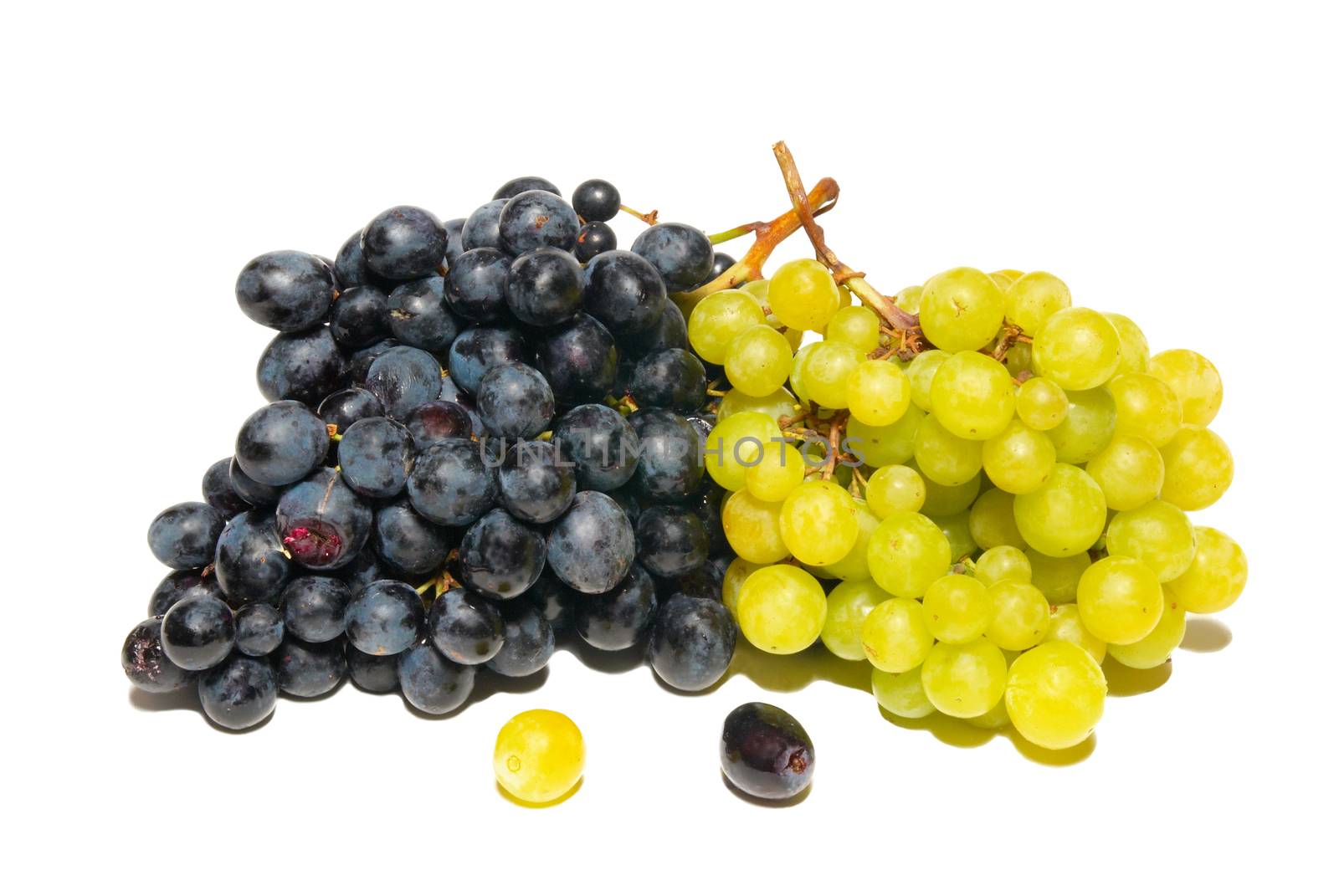 Black and green grapes isolated on white. by vapi