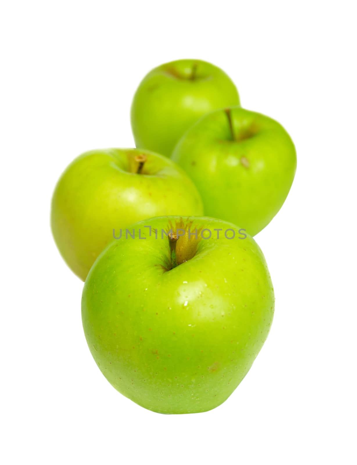 Row of green apples isolated on white. by vapi