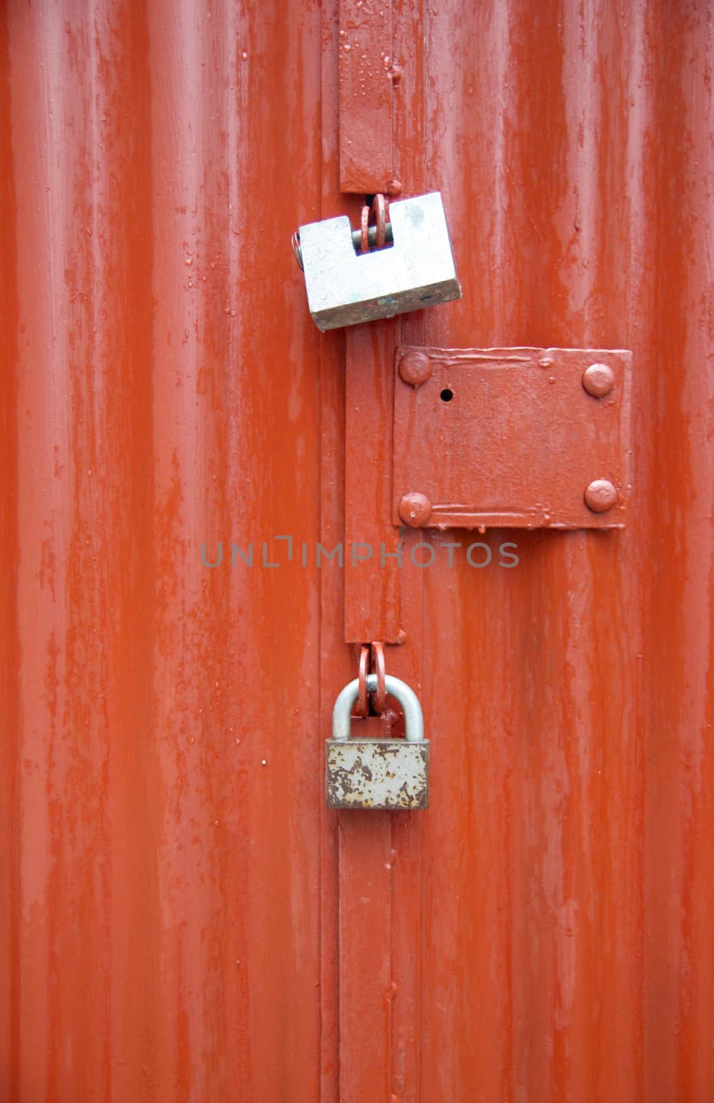 Lock on the red door. by vapi