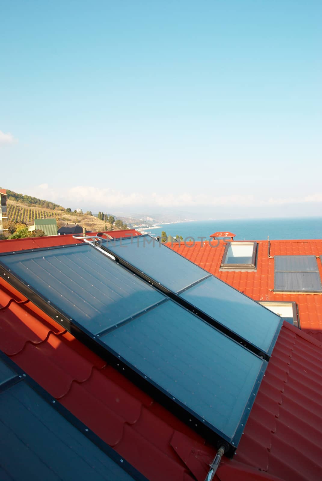 Alternative energy- solar system on the house roof.