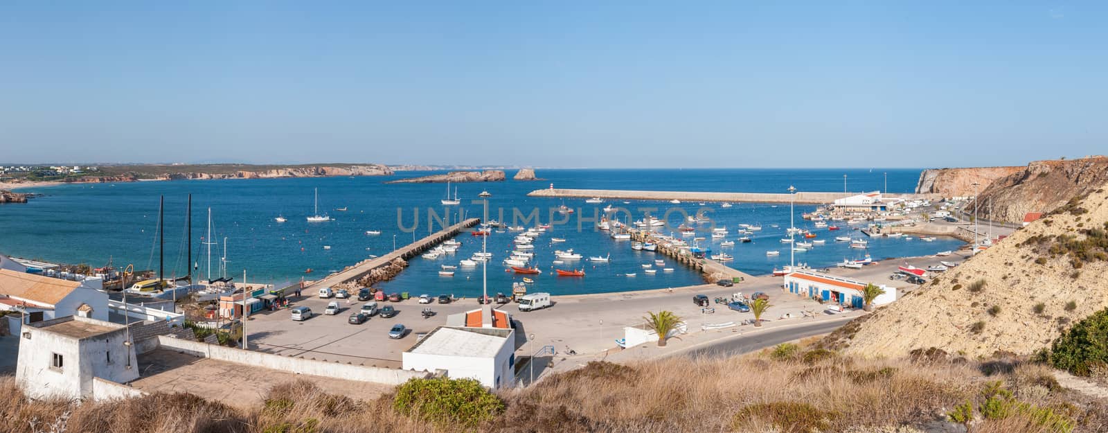 Panoramic view of old port in Sagres with traditional fishing boats, Algarve, Portugal