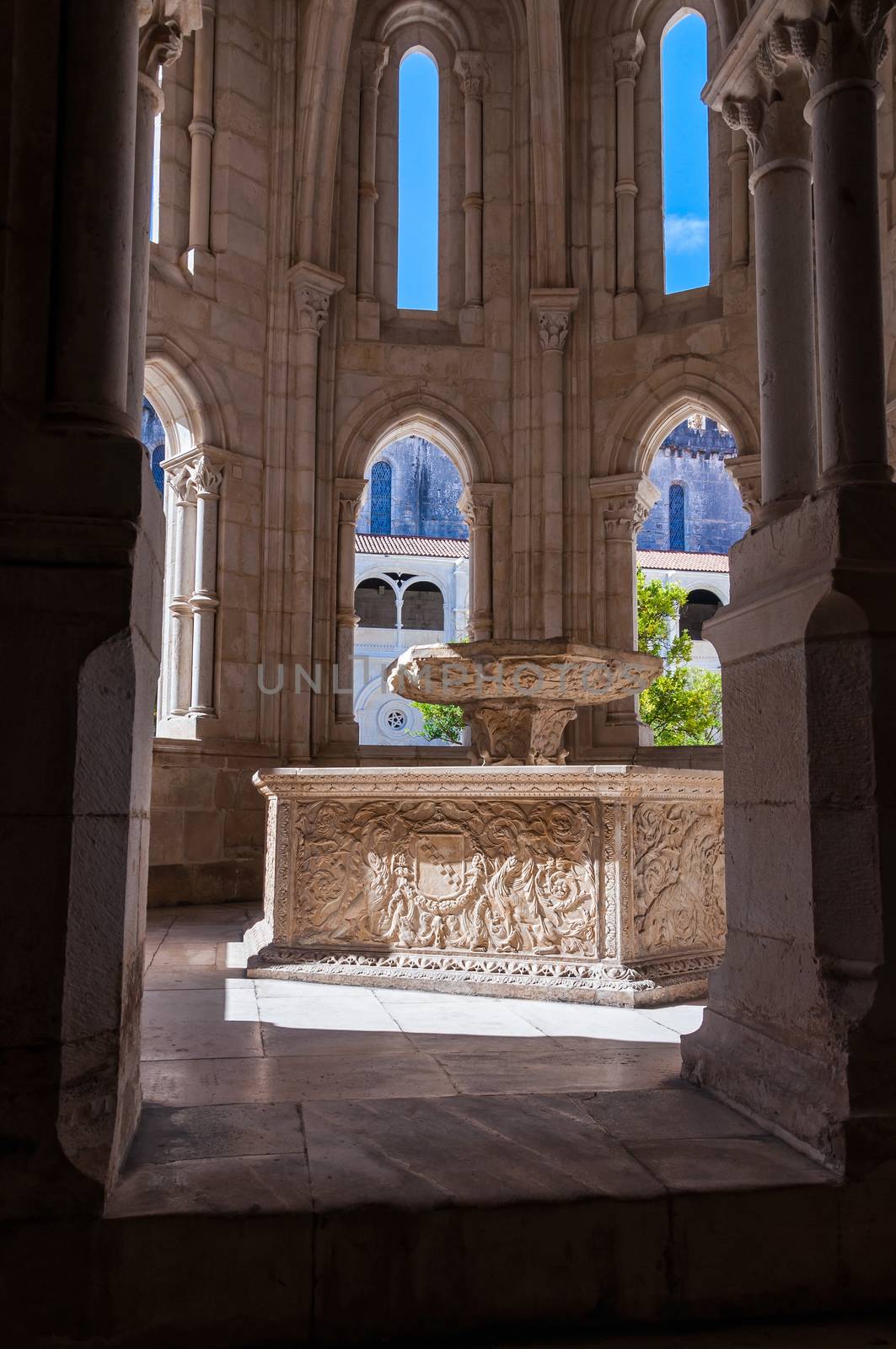 Renaissance water basin within the Gothic fountain house in the cloister of the Monastery of Alcobaca