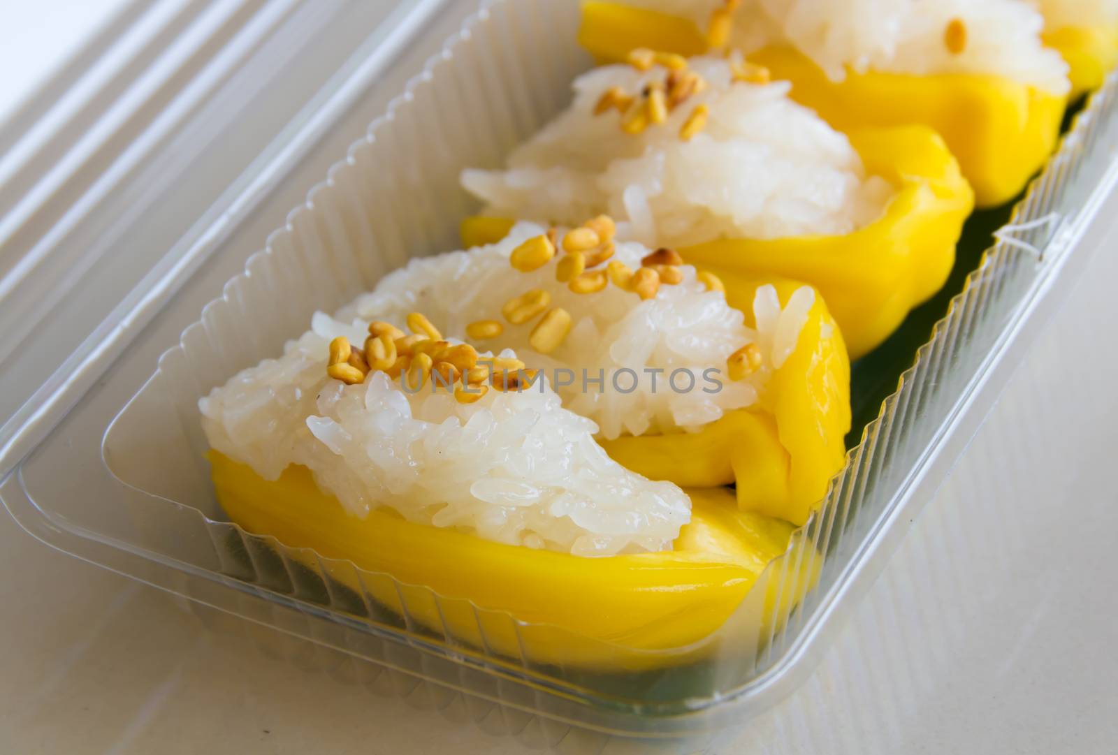 Coconut milk rice on jackfruit with roasted sesame