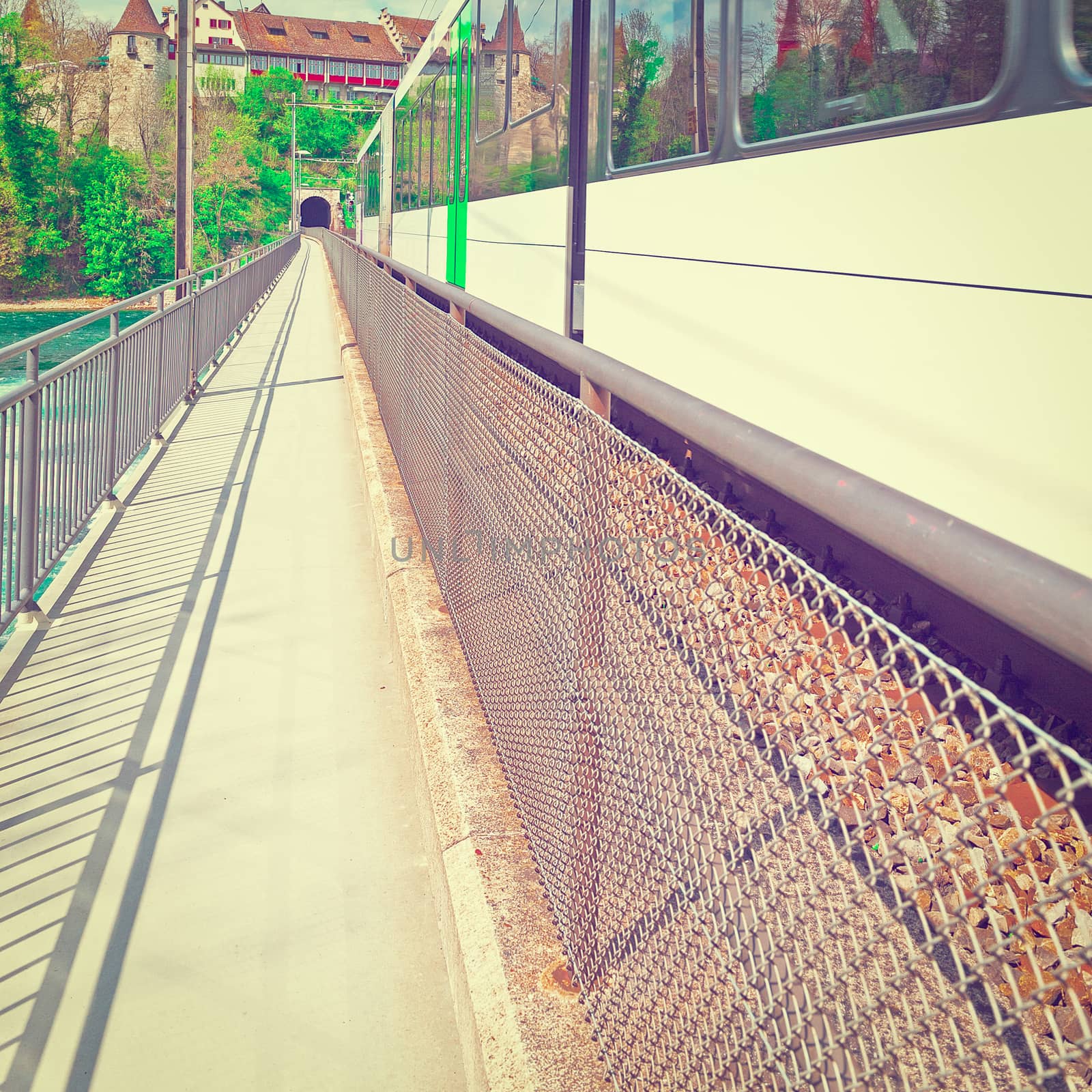 Train Enters Railway Tunnel under the City in the Swiss Alps, Instagram Effect