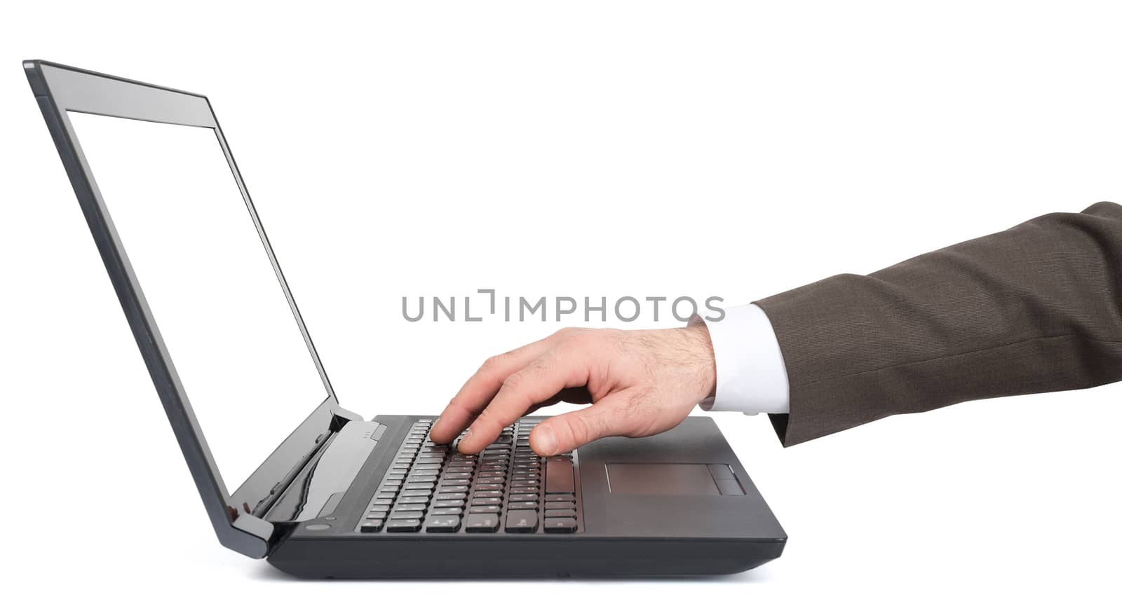 Businessmans hand working on laptop isolated on white background
