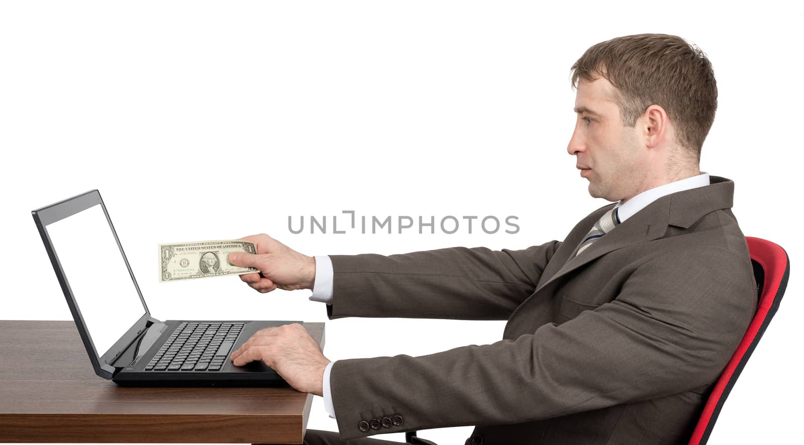 Businessman giving to laptop cash isolated on white background