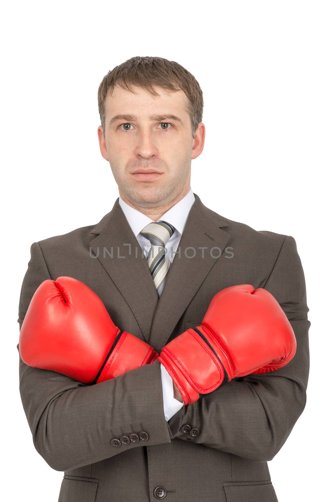 Serious businessman with crossed arms in red boxing gloves  isolated on white background