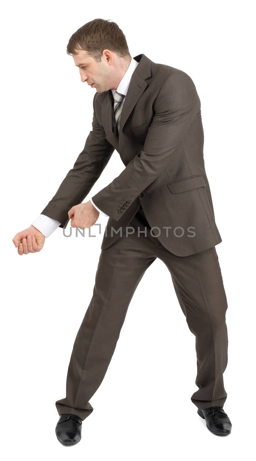 Businessman holding invisible axe by cherezoff