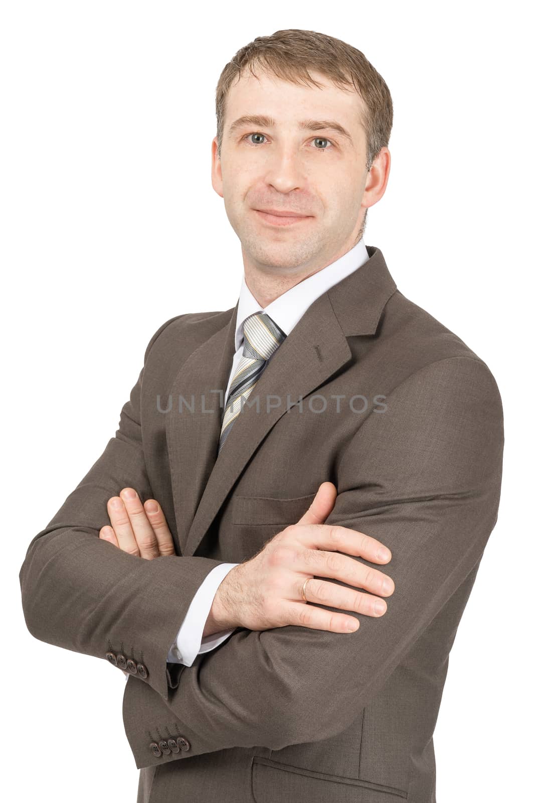 Businessman with crossed arms looking at camera isolated on white background