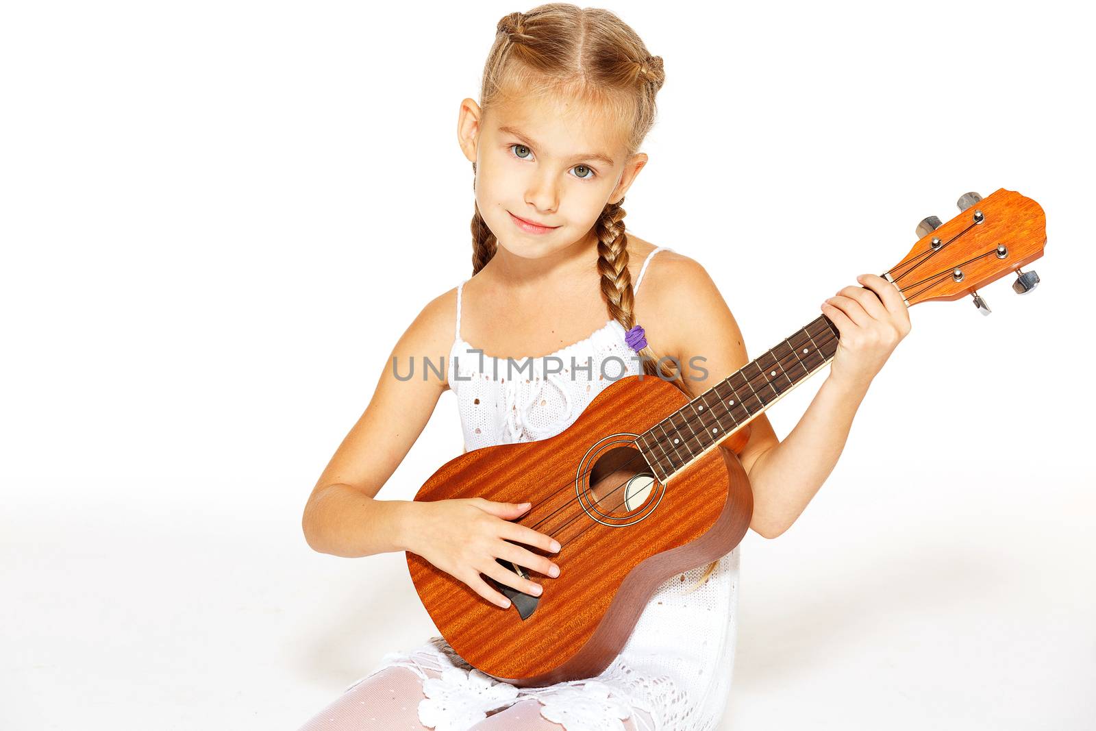 Beautiful little girl with a guitar  by gorov108