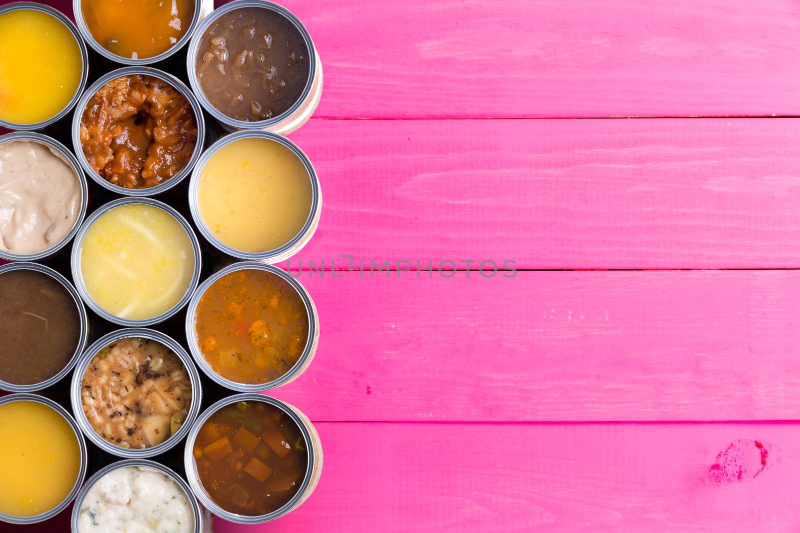 Open Cans of Soup on Bright Pink Background by coskun