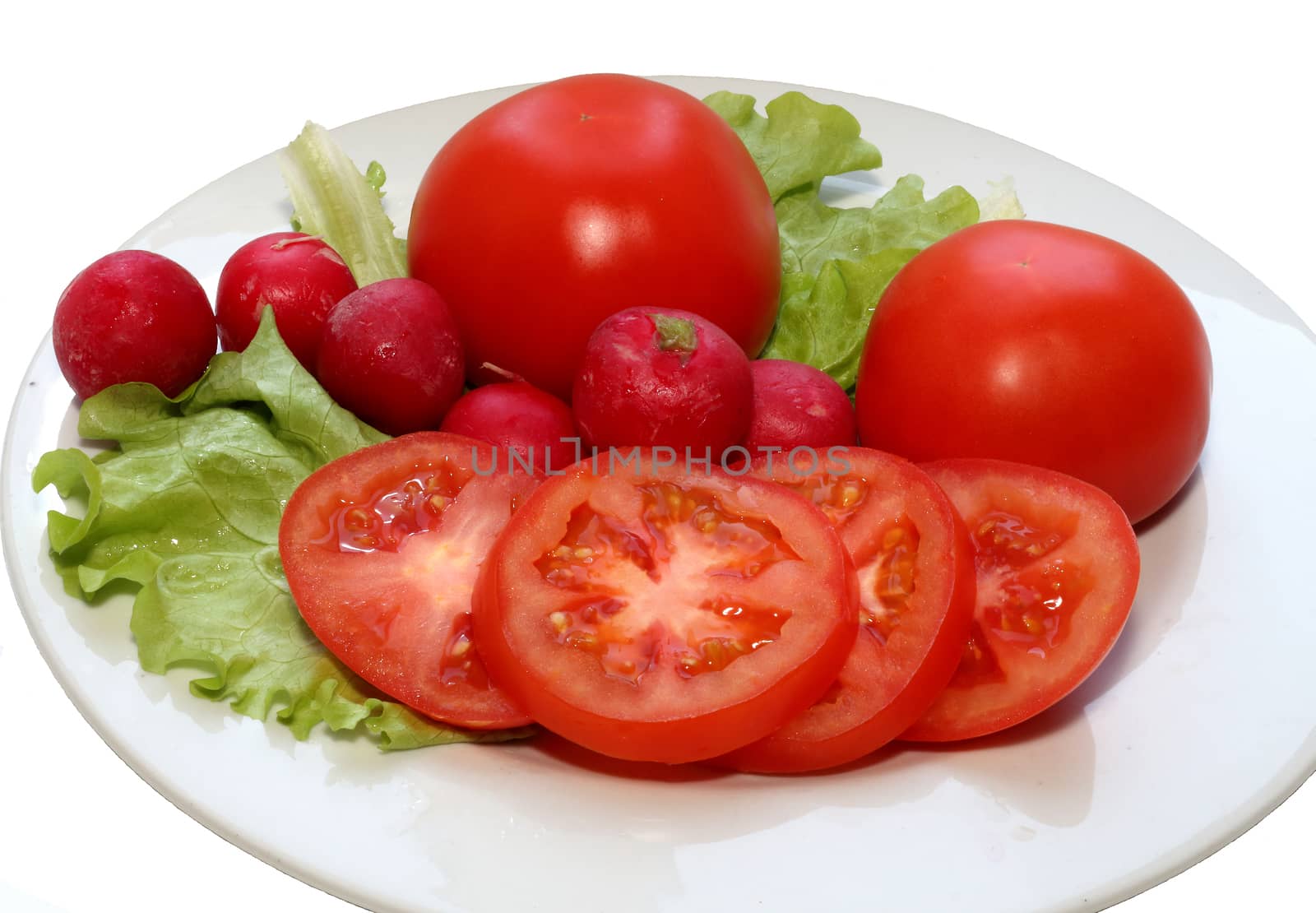 Radishes, tomatoes and lettuce. A healthy diet. by Maris