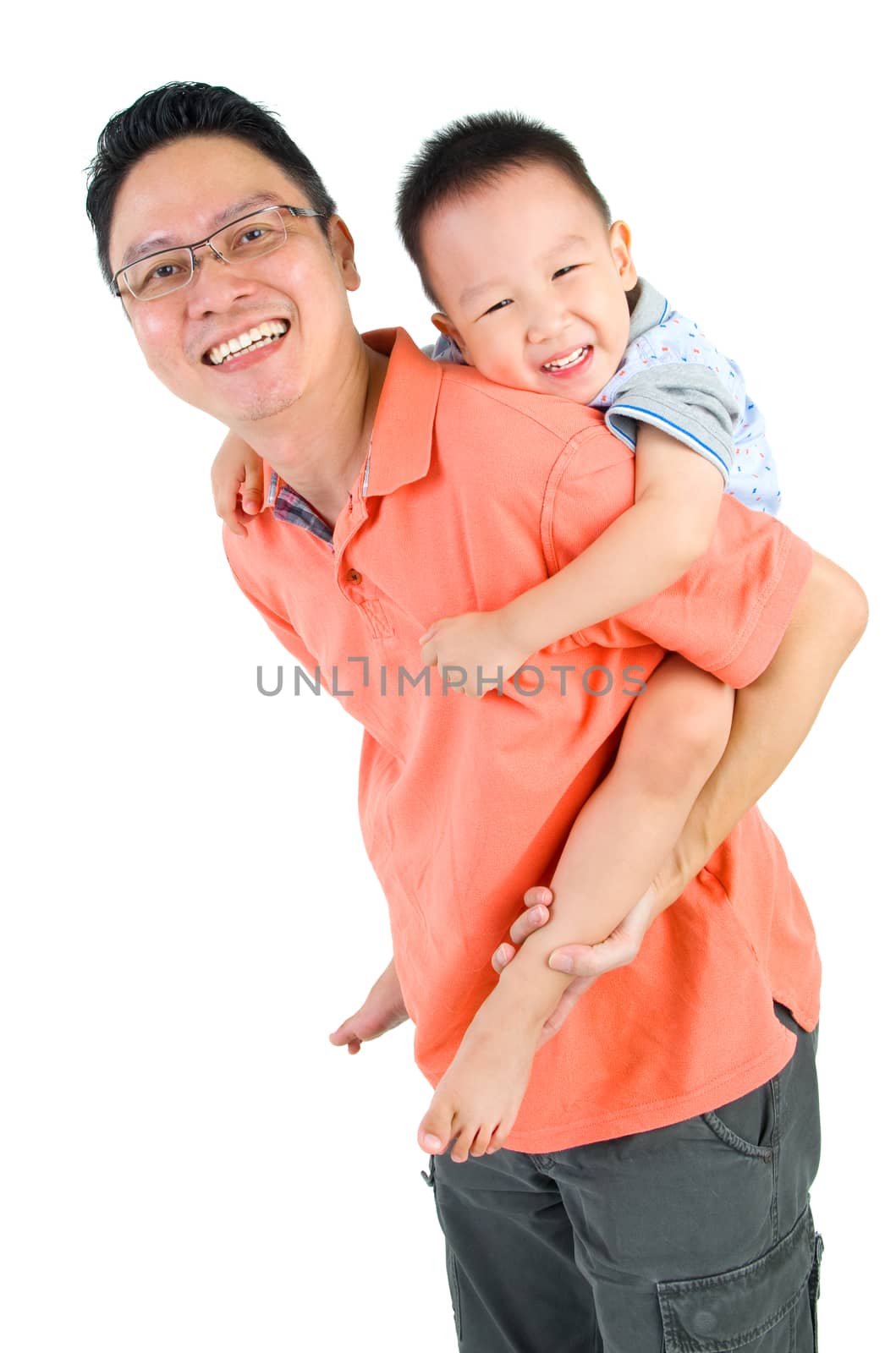 Asian father piggyback his son