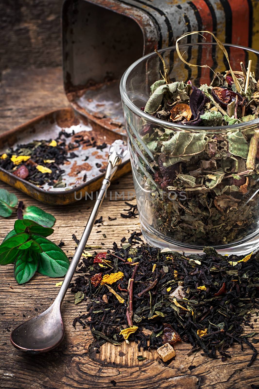 tea tea leaves scattered on the table in country style.Selective focus