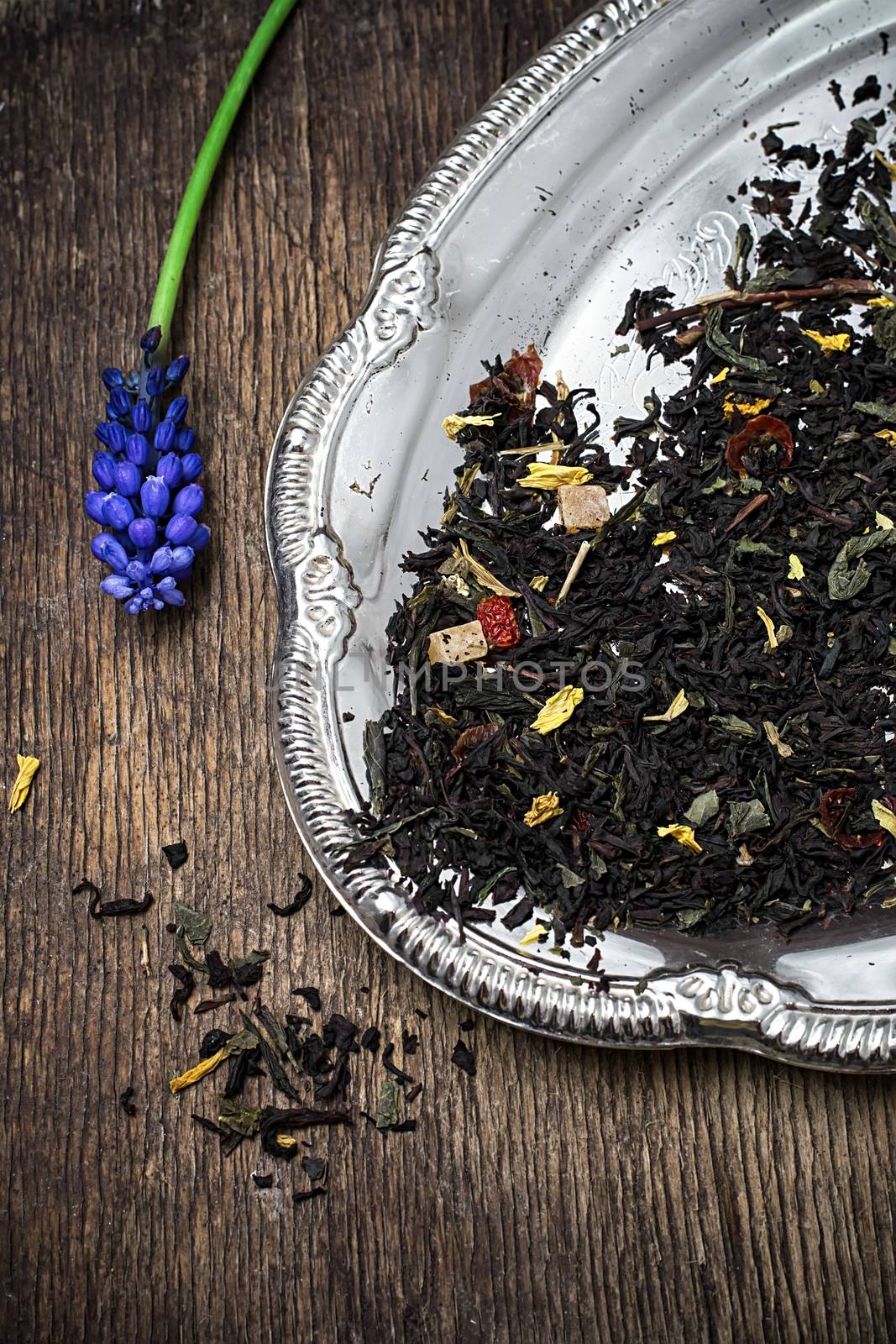 tea tea leaves scattered on the table in country style.Selective focus