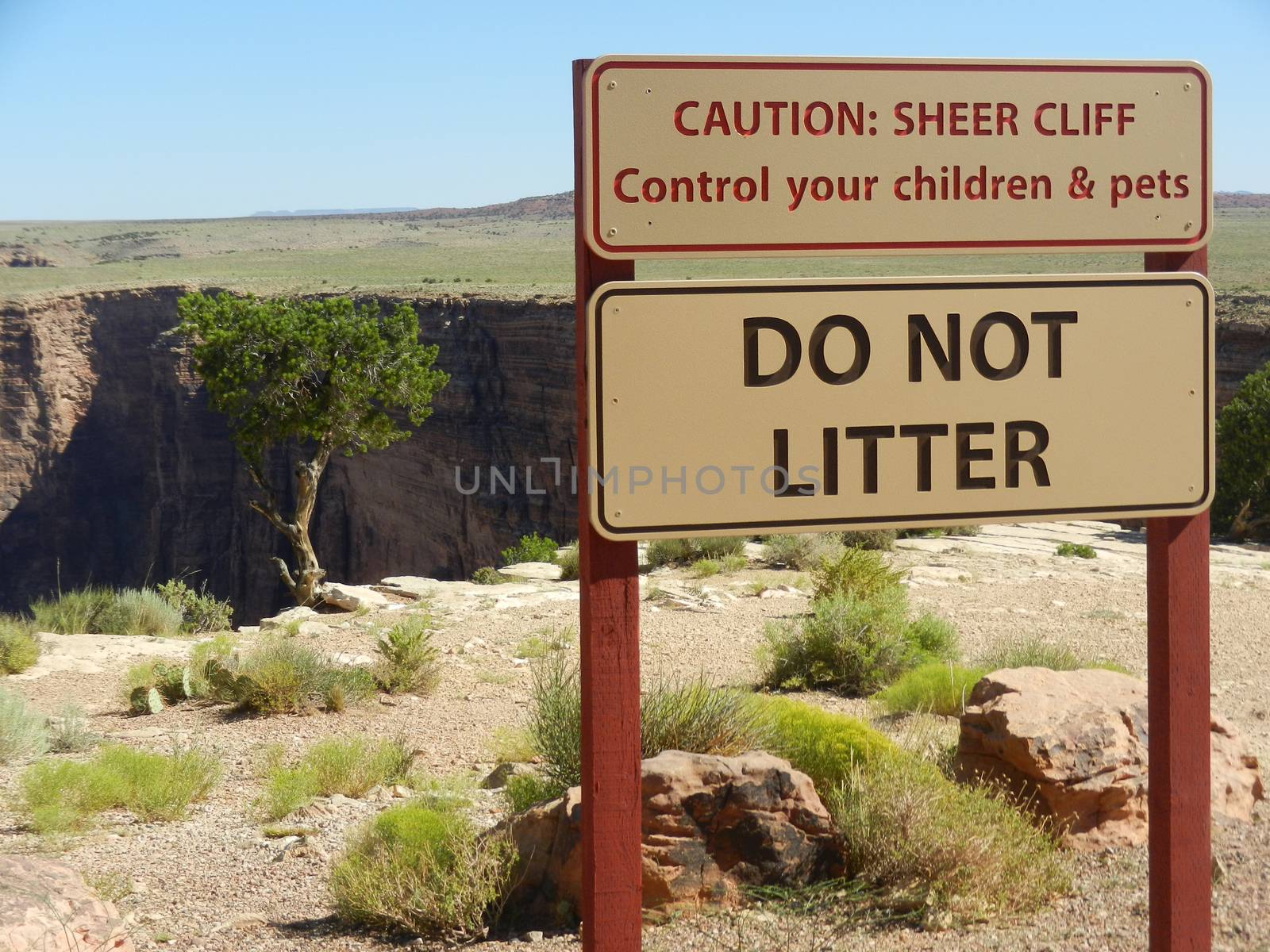 Caution: Sheer Cliff. Control your Children and Pets. Do Not Litter