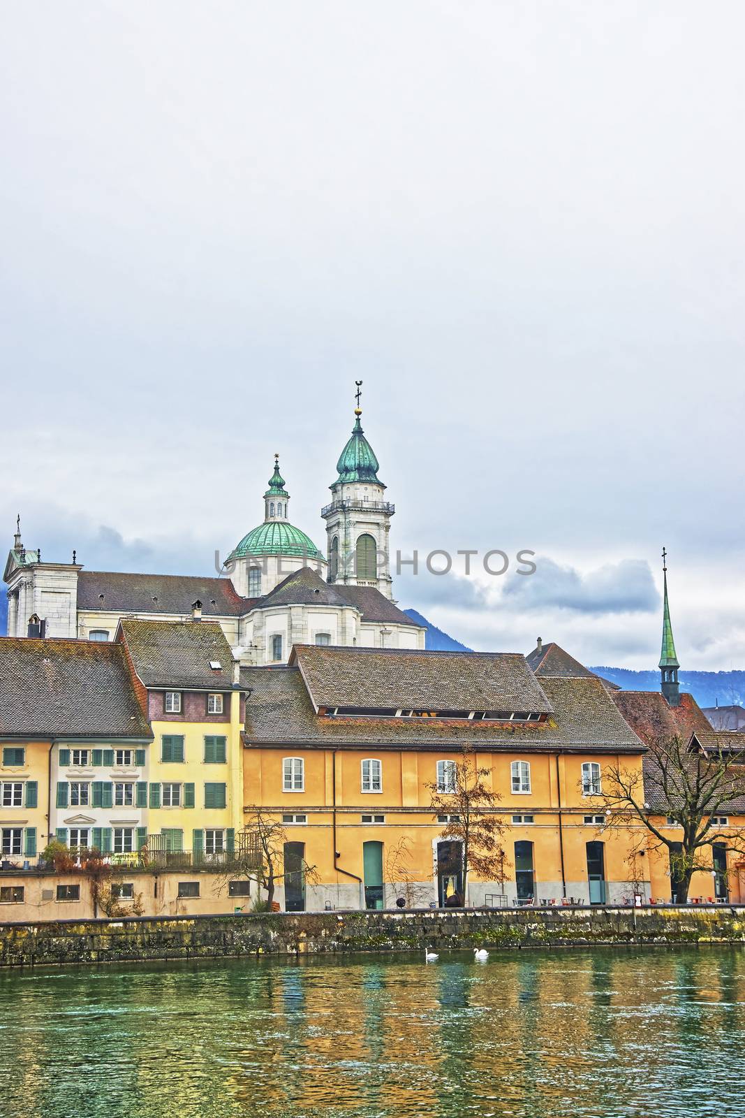 Waterfront and Saint Ursus Cathedral in Solothurn. Solothurn is the capital of Solothurn canton in Switzerland. It is located on the banks of Aare and on the foot of Weissenstein Jura mountains